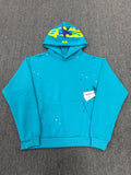 Sp5der Heavy Web Hoodie in 'Cyan' is designed with a striking blue color and a signature web-inspired graphic on the hood