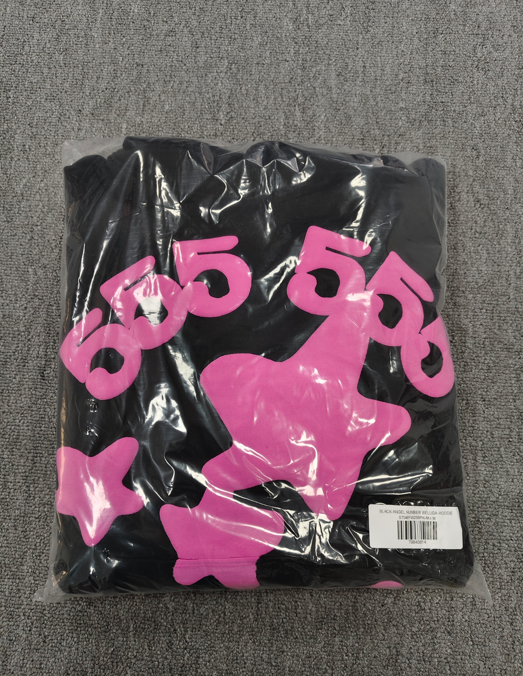 Sp5der Beluga Angel Number Hoodie in black featuring a prominent pink puff-print graphic on the chest