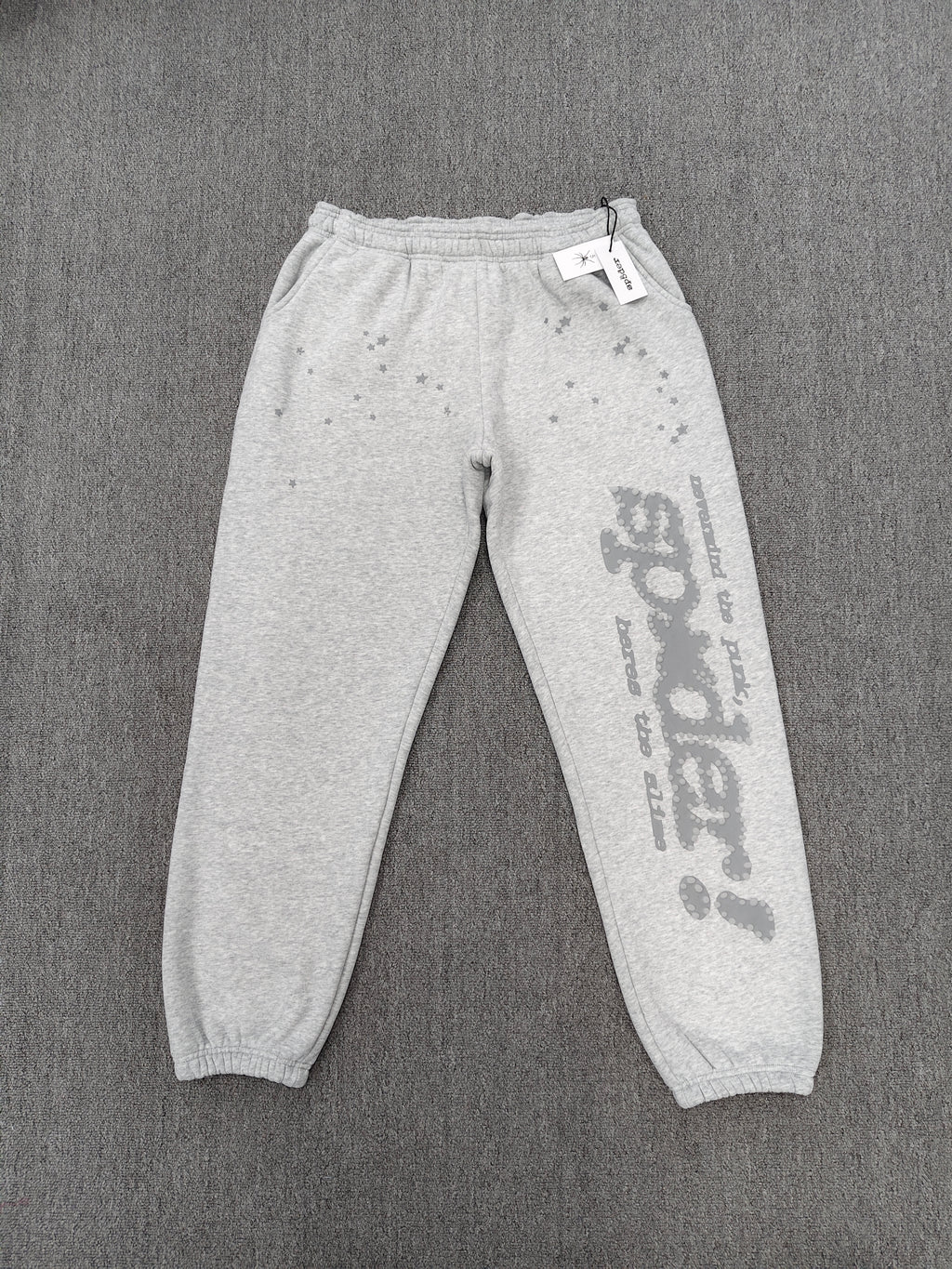Sp5der Tonal Punk V2 sweatpants in Sport Grey feature scattered star prints and a large graphic logo down the leg