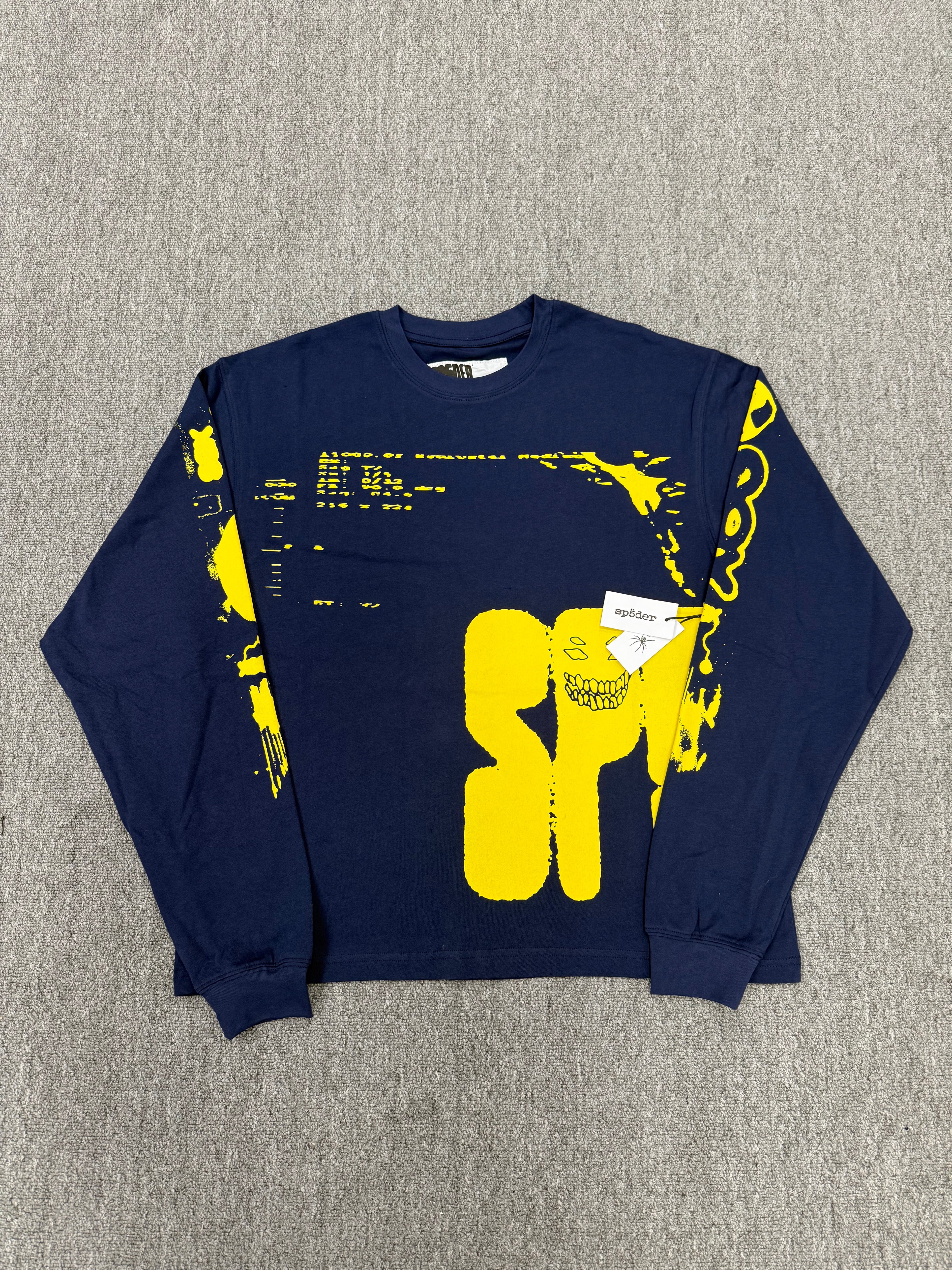 navy blue Sp5der X-Ray Longsleeve featuring bright yellow graphics on the front and sleeves