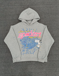 grey Sp5der hoodie features a prominent pink rhinestone graphic and a blue spiderweb design