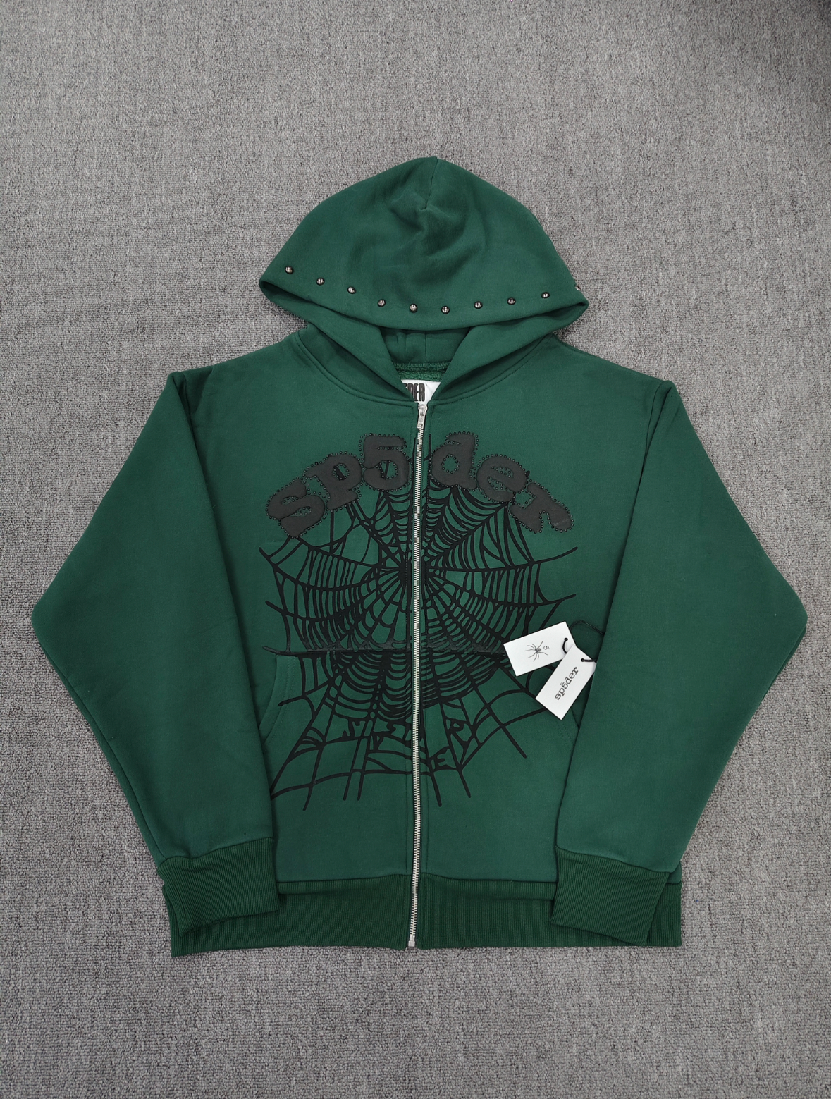 Sp5der OG Web Studded Zip Hoodie in green featuring black graphic detailing