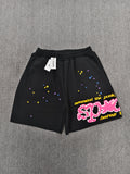 Sp5der Punk V2 shorts in black, featuring a vibrant pink logo and scattered colorful stars