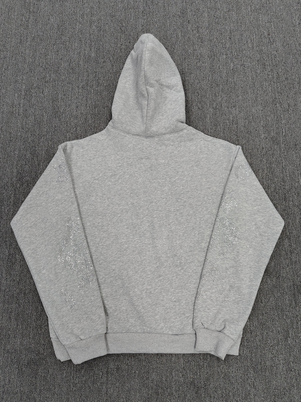 heather grey Sp5der Rhinestone Beluga hoodie features prominent crystal-embellished star designs on the front and sleeves
