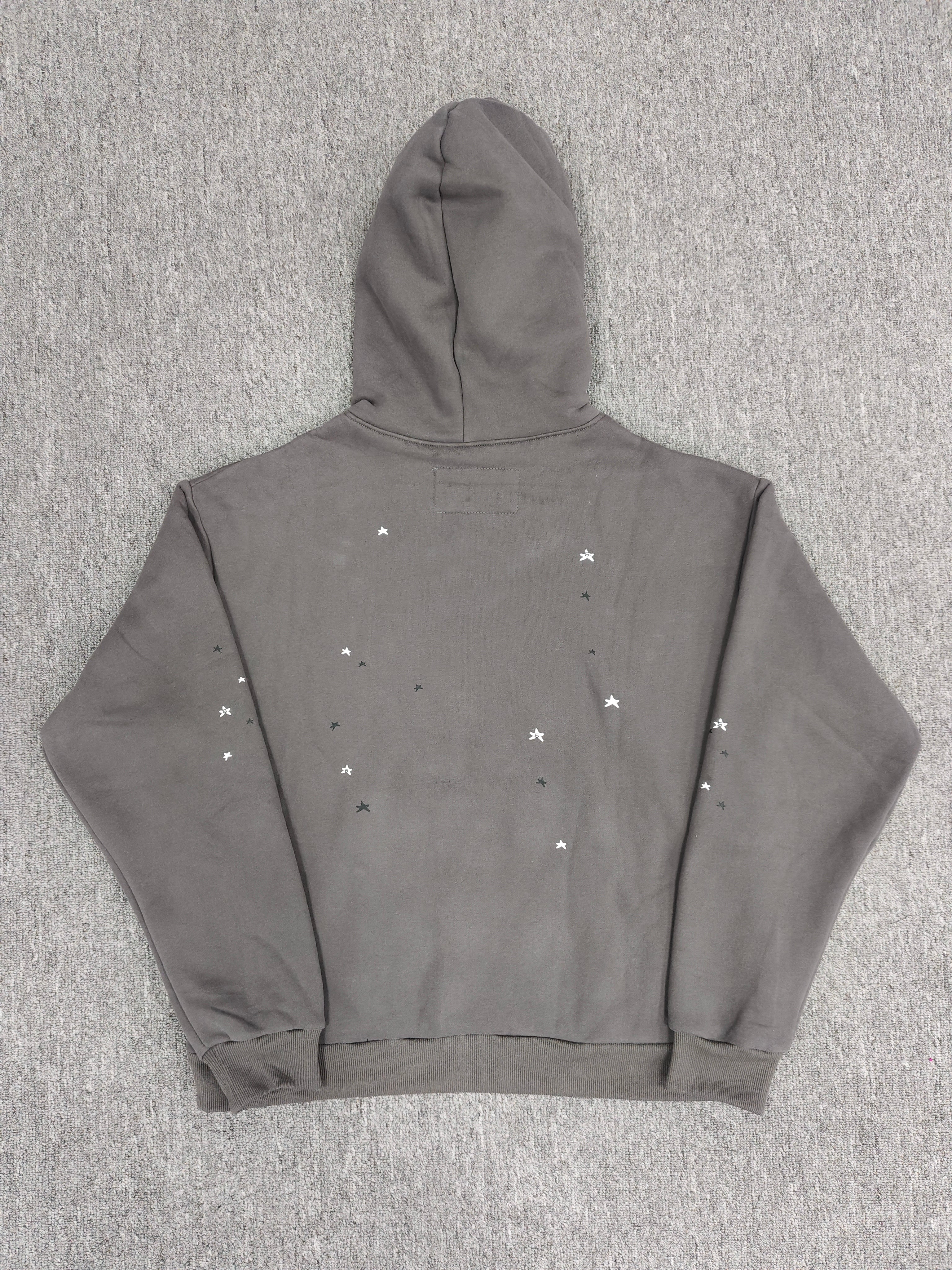 slate grey Sp5der Splat Punk Hoodie features a prominent red spider-web graphic with white star accents