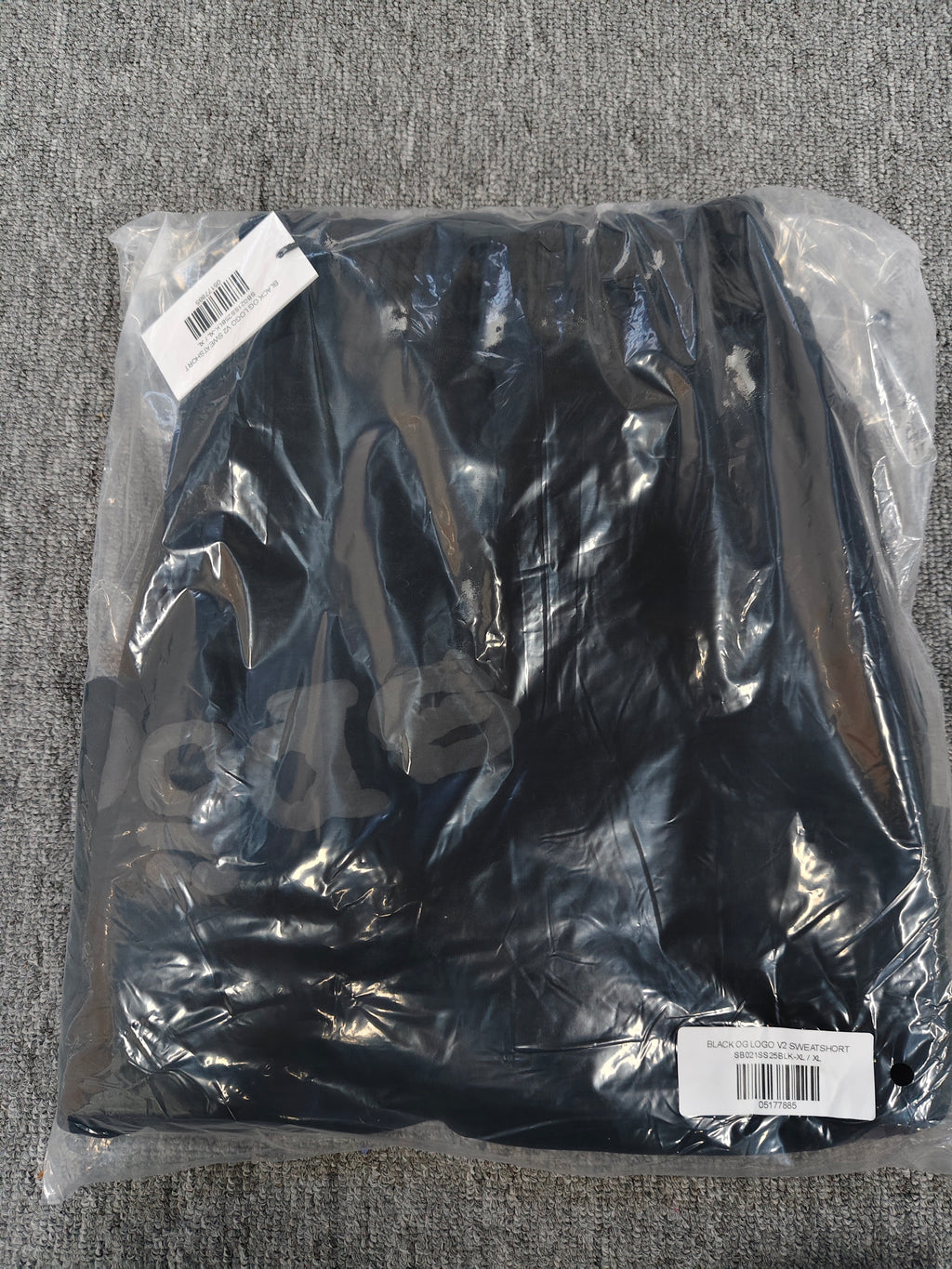 Sp5der OG Web V2 Phantom shorts in black feature a prominent rhinestone logo