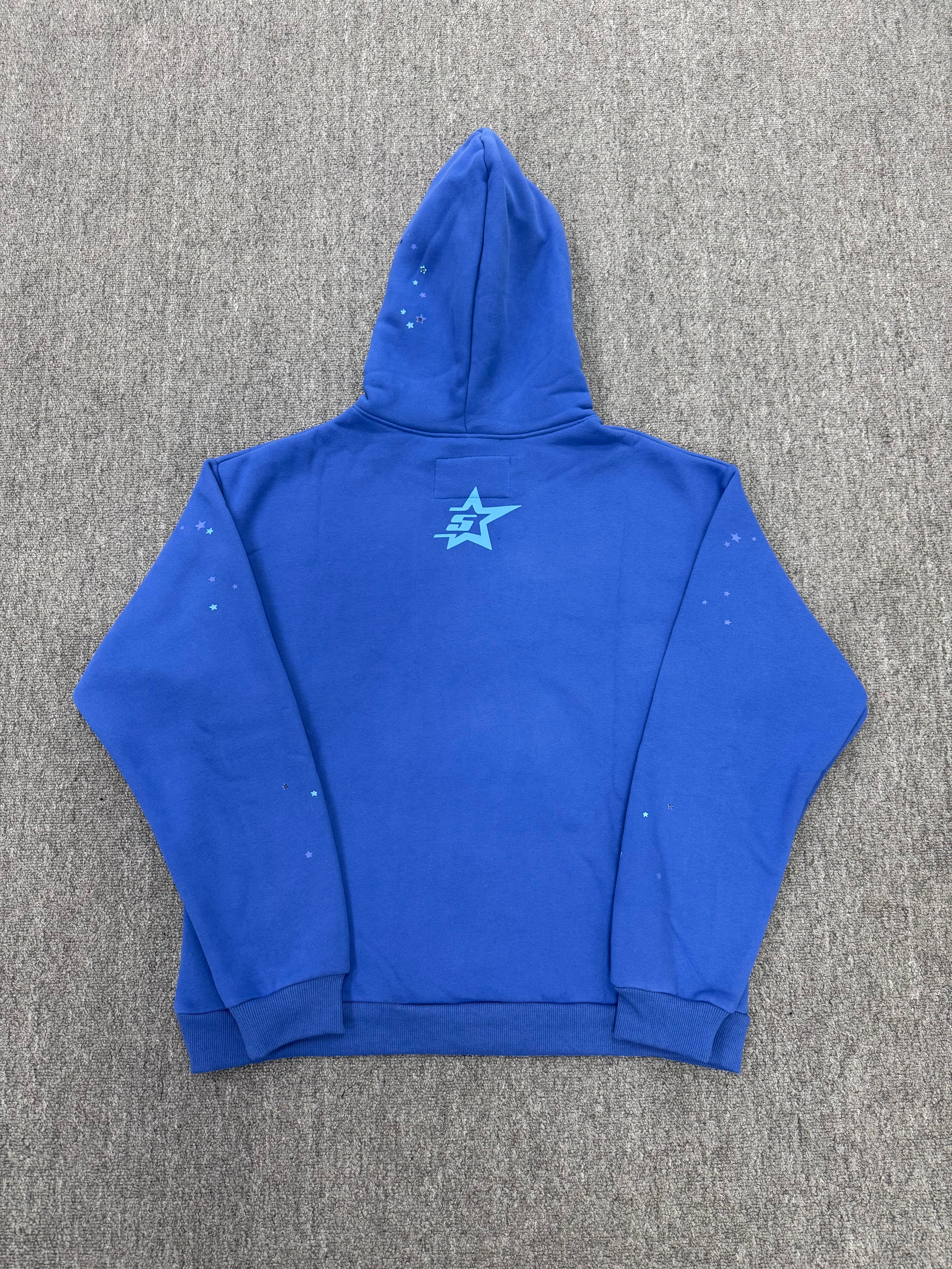 blue hoodie is a SP5DER Punk V2 model featuring a prominent spider-web graphic with rhinestone embellishments