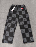 Chrome hearts Matty Boy Anti Promo 99 Eyes sweatpants in a black and grey checkerboard pattern.