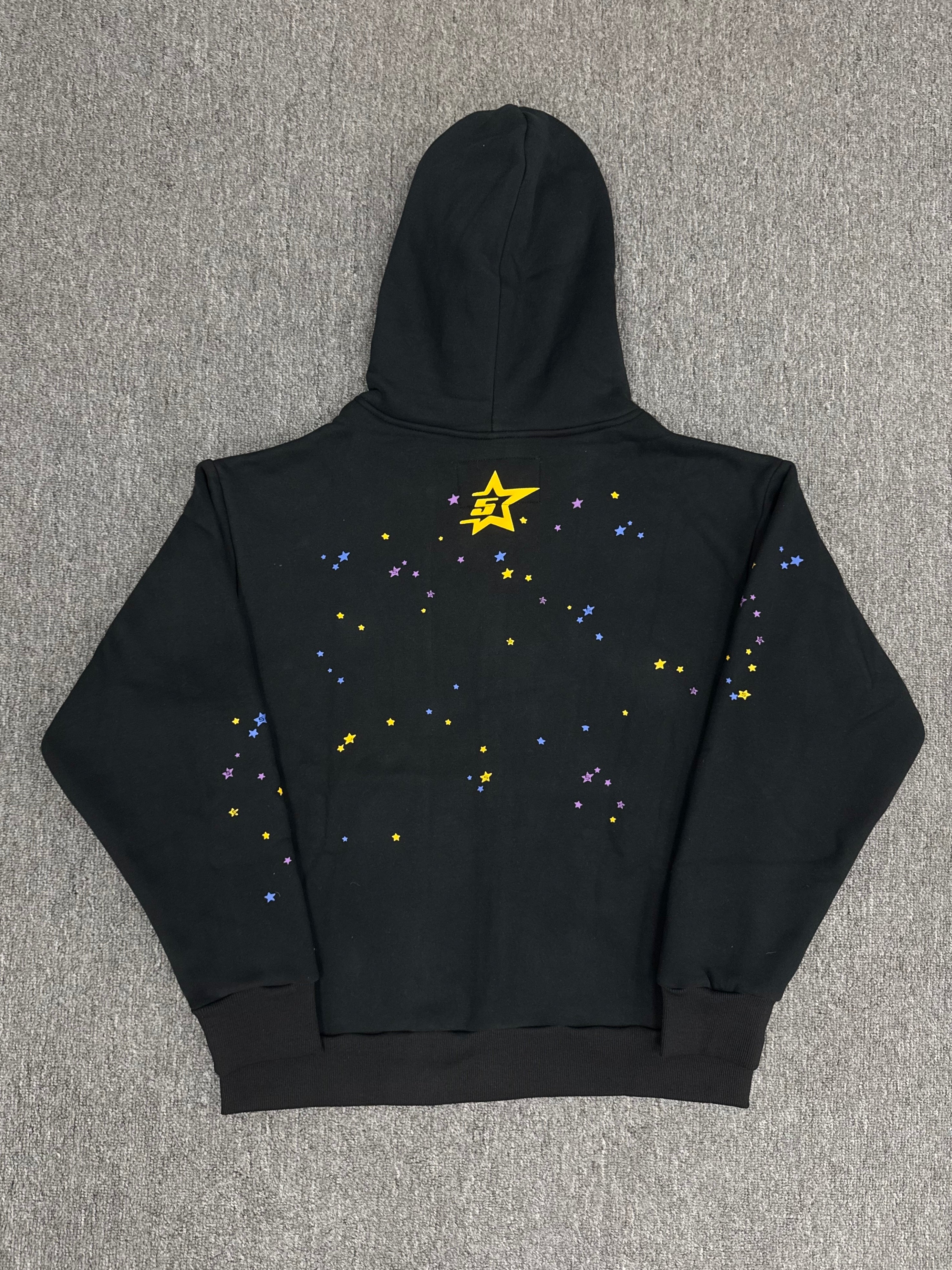 black Sp5der Punk V2 Zip Up hoodie features a pink logo and a large spider web graphic