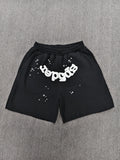 black Sp5der OG Web Logo sweatshorts featuring a prominent white puff-print logo and scattered star graphics