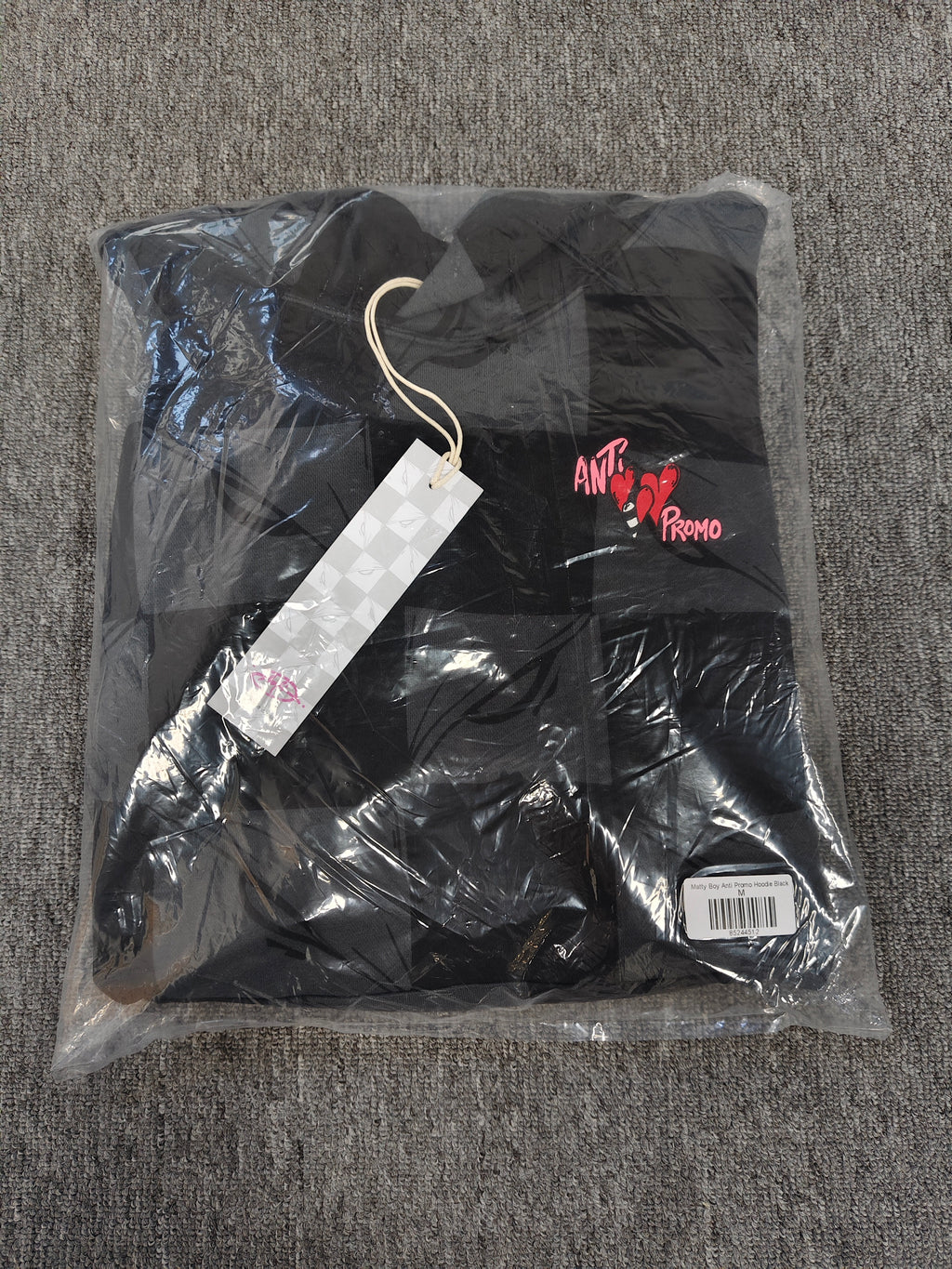 a Chrome Hearts Matty Boy "Anti Promo" 99 Eyes Hoodie featuring a checkered pattern.