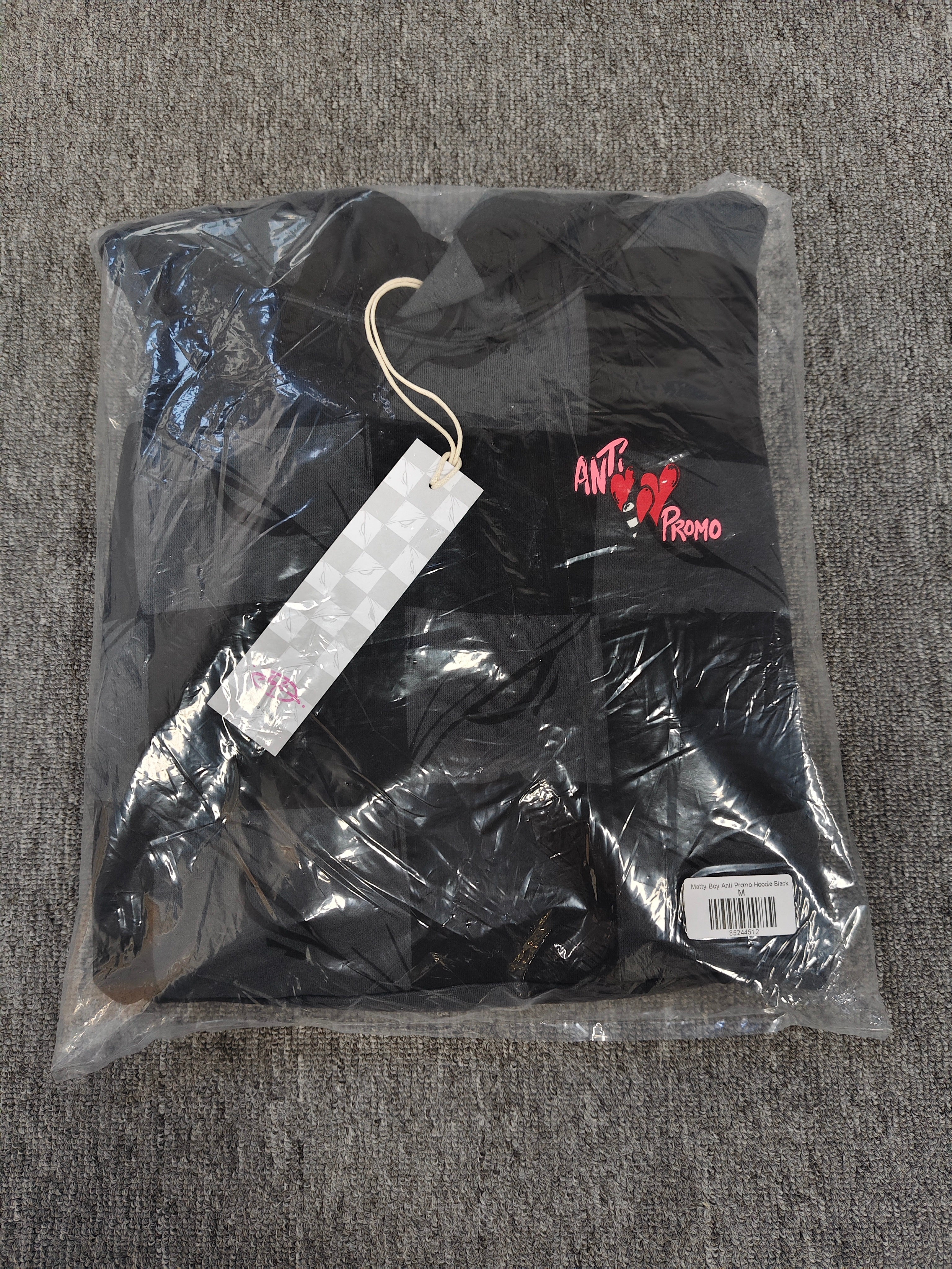 a Chrome Hearts Matty Boy "Anti Promo" 99 Eyes Hoodie featuring a checkered pattern.