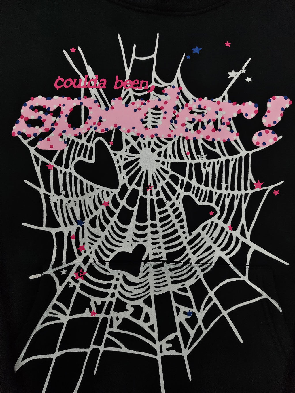 SP5DER CB Punk V2 Hoodie features a bold pink and white cobweb graphic on the chest