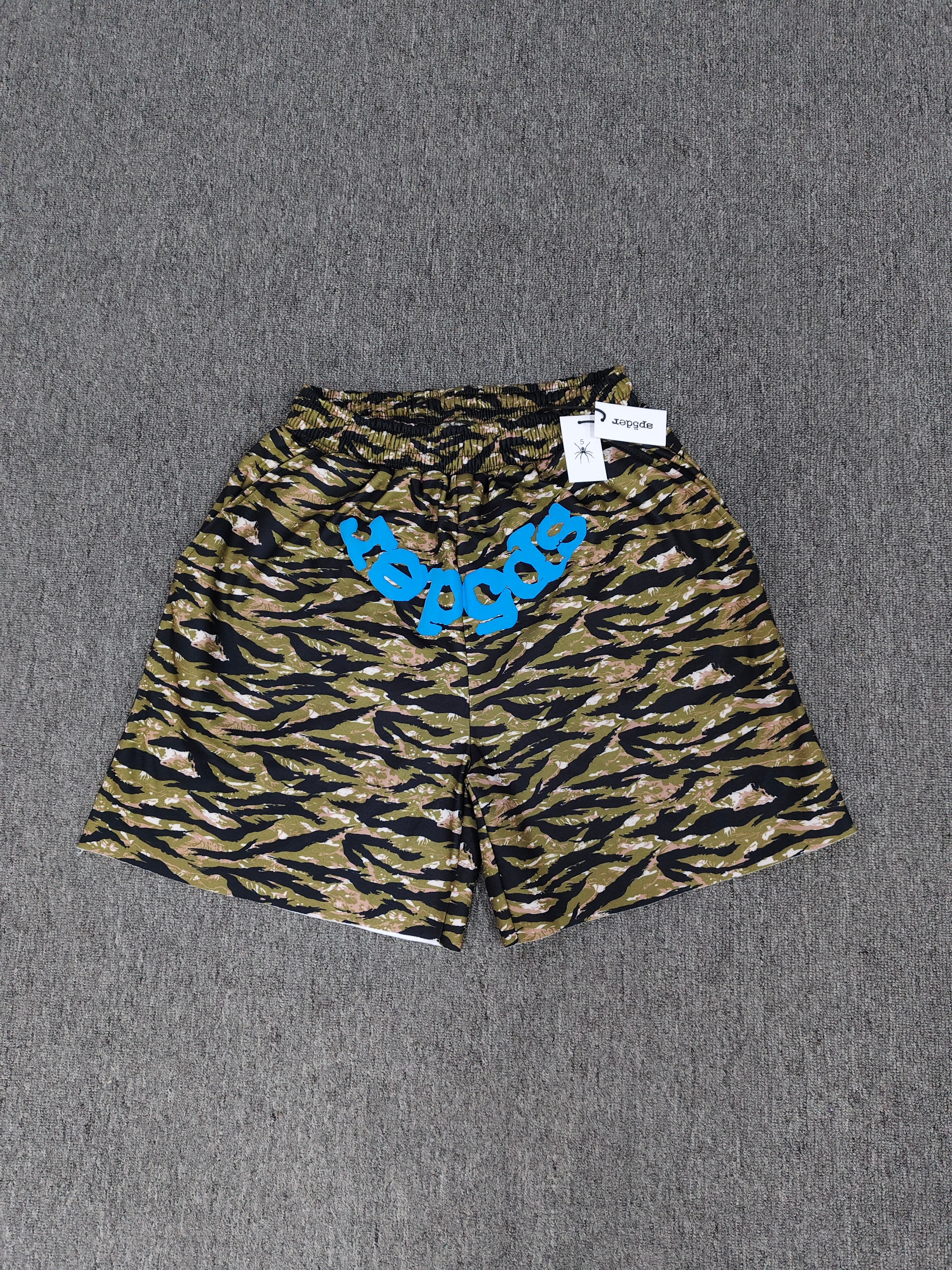 Sp5der OG Web V2 Tiger Camo Sweatshorts featuring a prominent tiger stripe pattern and an elasticated waistband