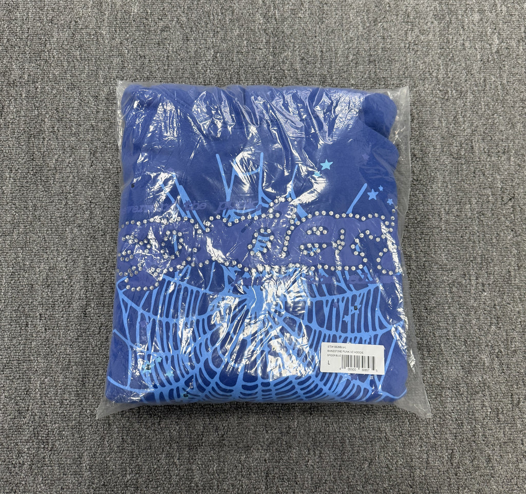 blue hoodie is a SP5DER Punk V2 model featuring a prominent spider-web graphic with rhinestone embellishments