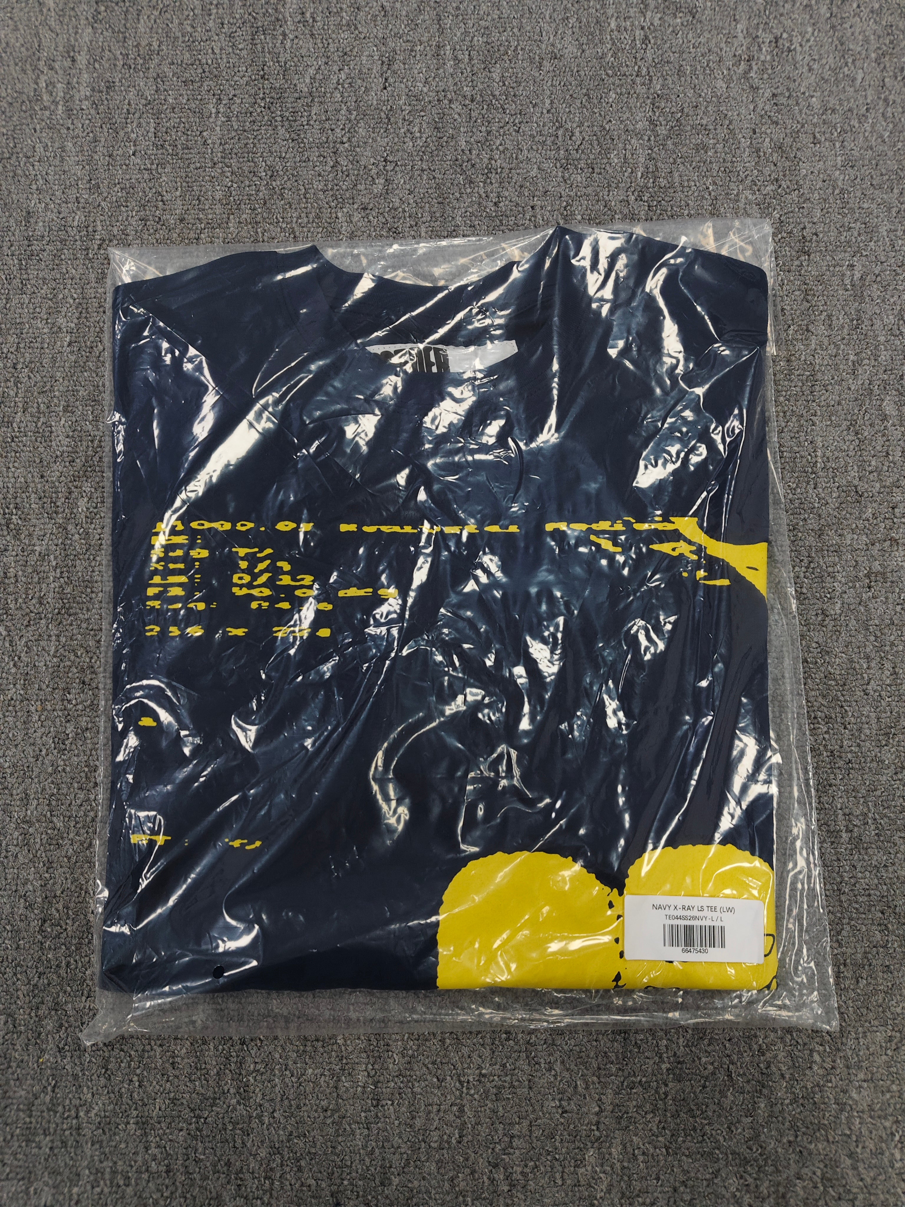 navy blue Sp5der X-Ray Longsleeve featuring bright yellow graphics on the front and sleeves