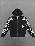 a Sp5der MX555 Zip Hoodie in black, featuring white graphic lettering and star prints on the sleeves