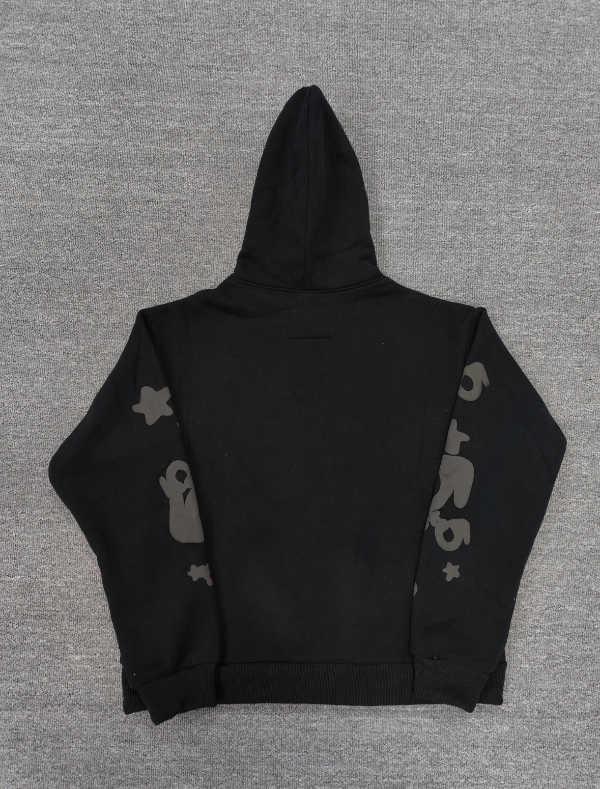 a Sp5der Reflective Beluga Hoodie in Black, featuring large reflective graphics