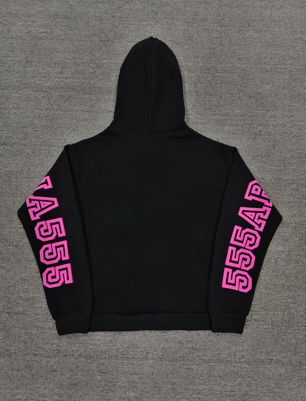 a black Sp5der Arachnophobia hoodie with vibrant pink lettering
