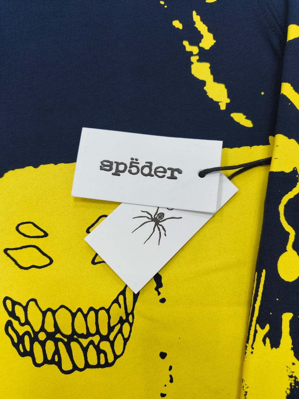 navy blue Sp5der X-Ray Longsleeve featuring bright yellow graphics on the front and sleeves