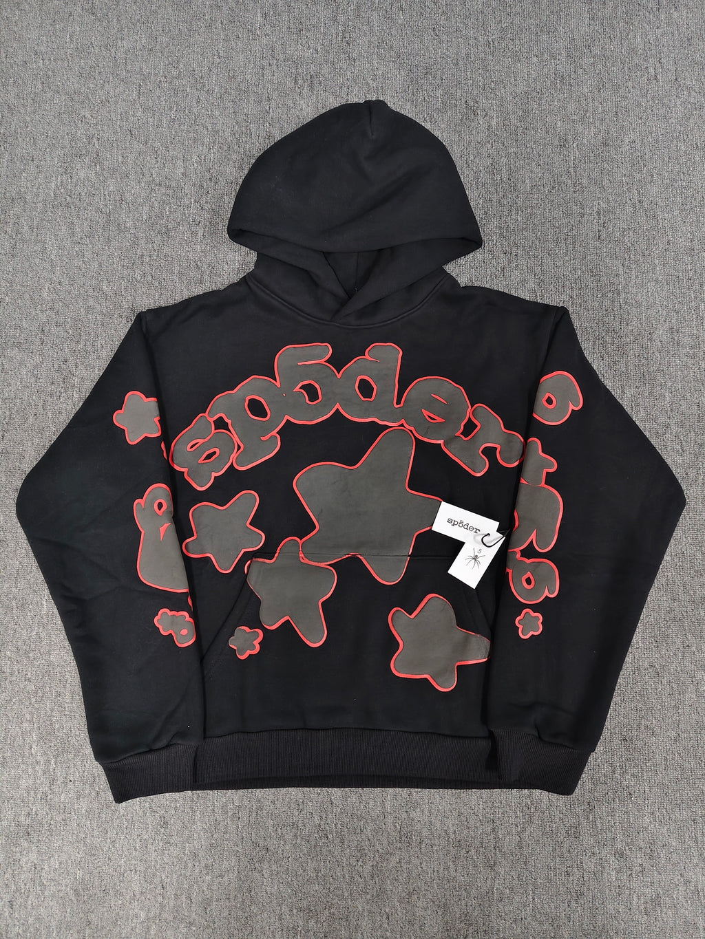 a black Sp5der Beluga Outline Hoodie featuring red-outlined star graphics