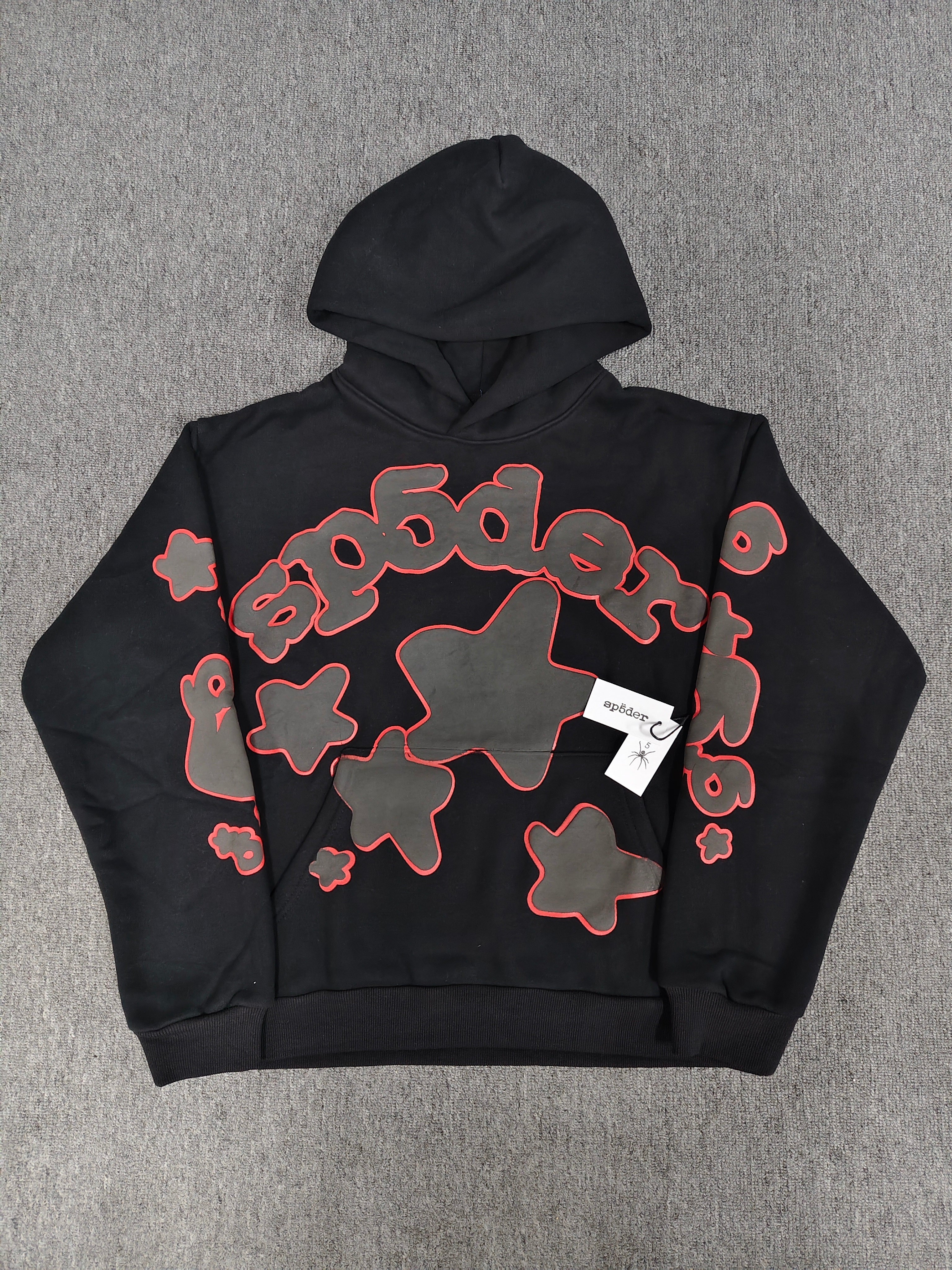 a black Sp5der Beluga Outline Hoodie featuring red-outlined star graphics