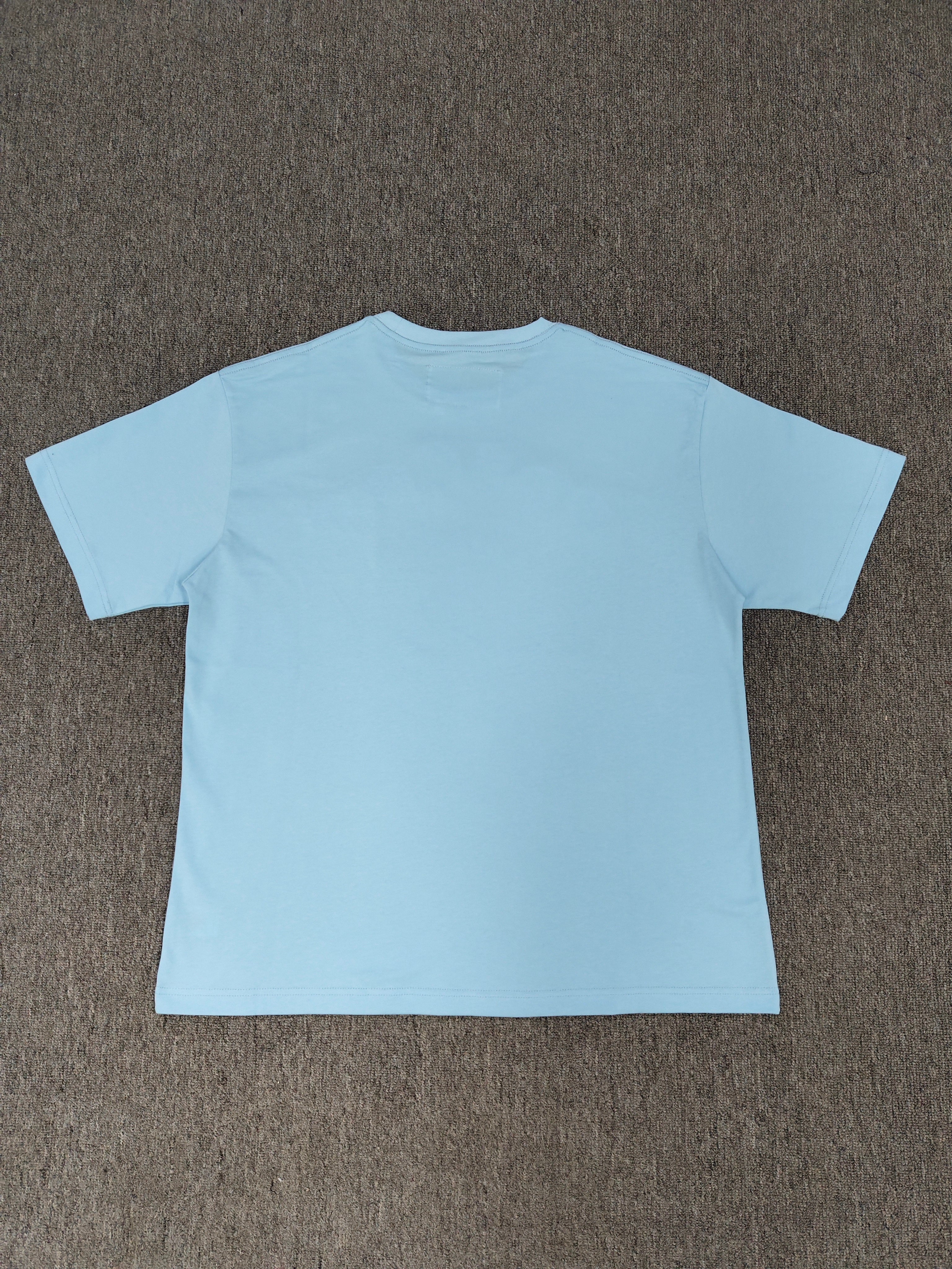 Sp5der shirts are featured in multiple colorways with prominent spiderweb branding