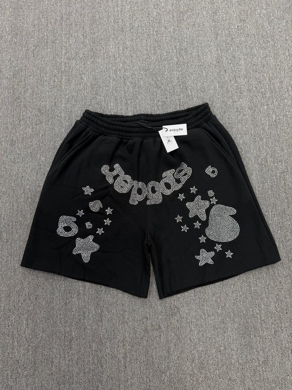 Sp5der Black Rhinestone Letter Print Jogger Shorts featuring a distinctive rhinestone star graphic.