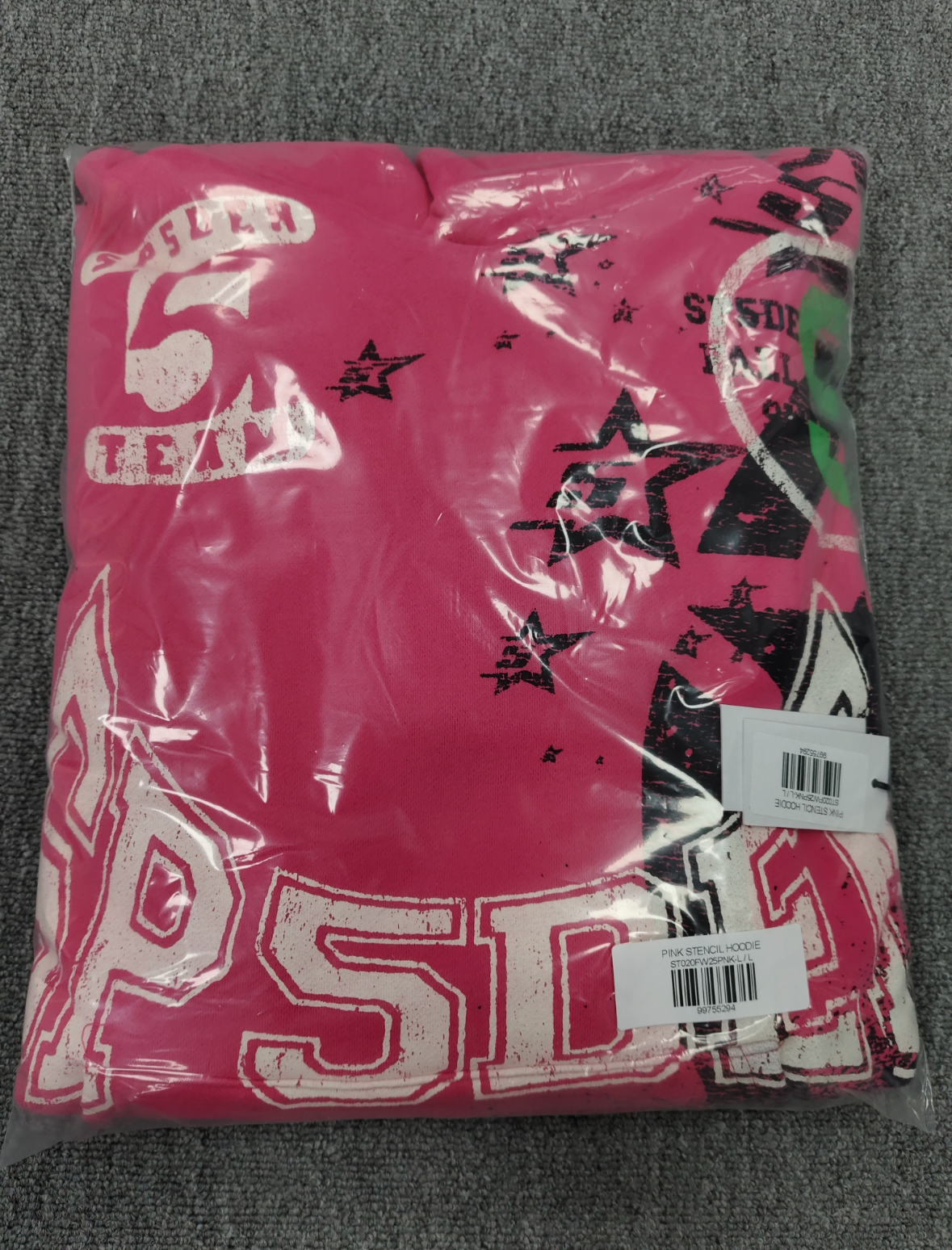 SP5DER Stencil hoodie featuring distressed white graphic branding and black star motifs
