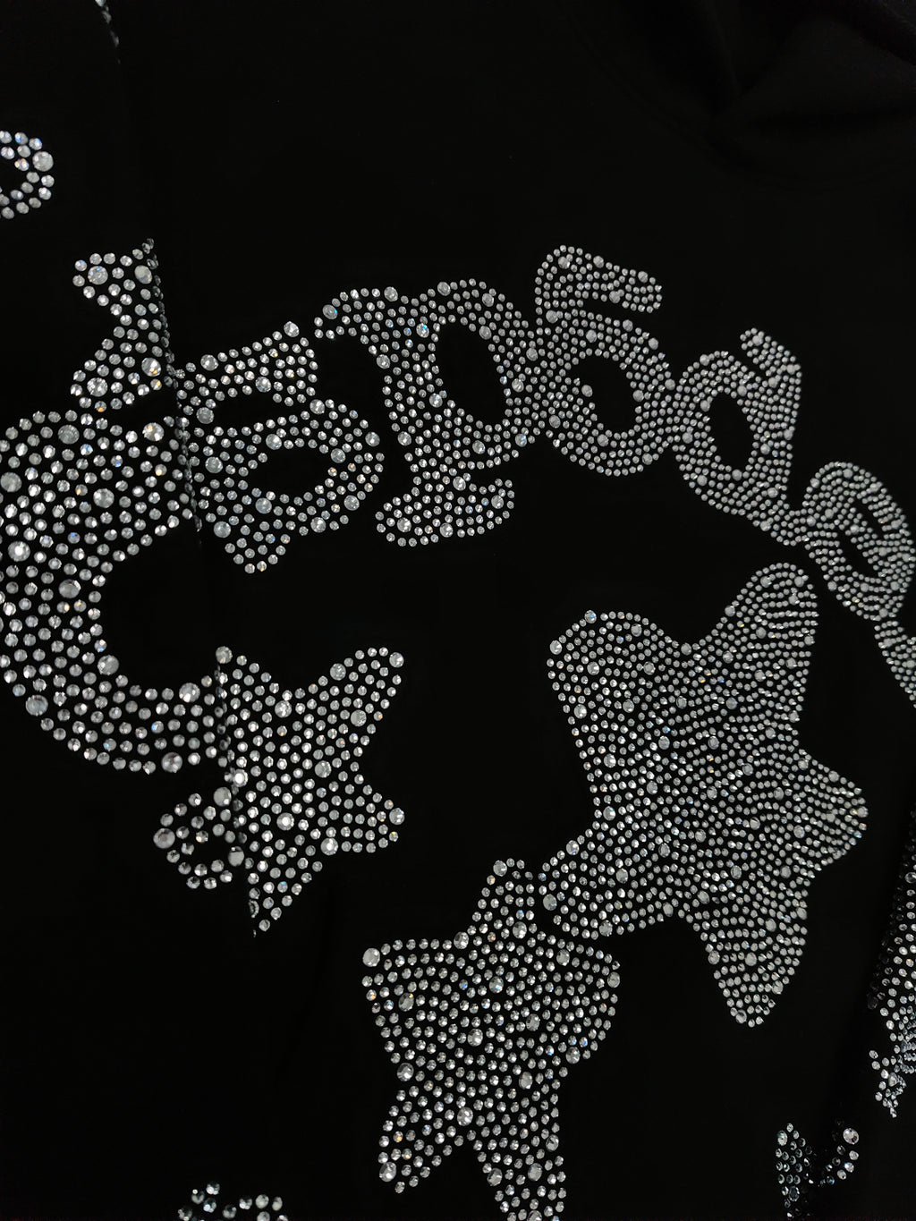 a Sp5der black rhinestone star logo hoodie