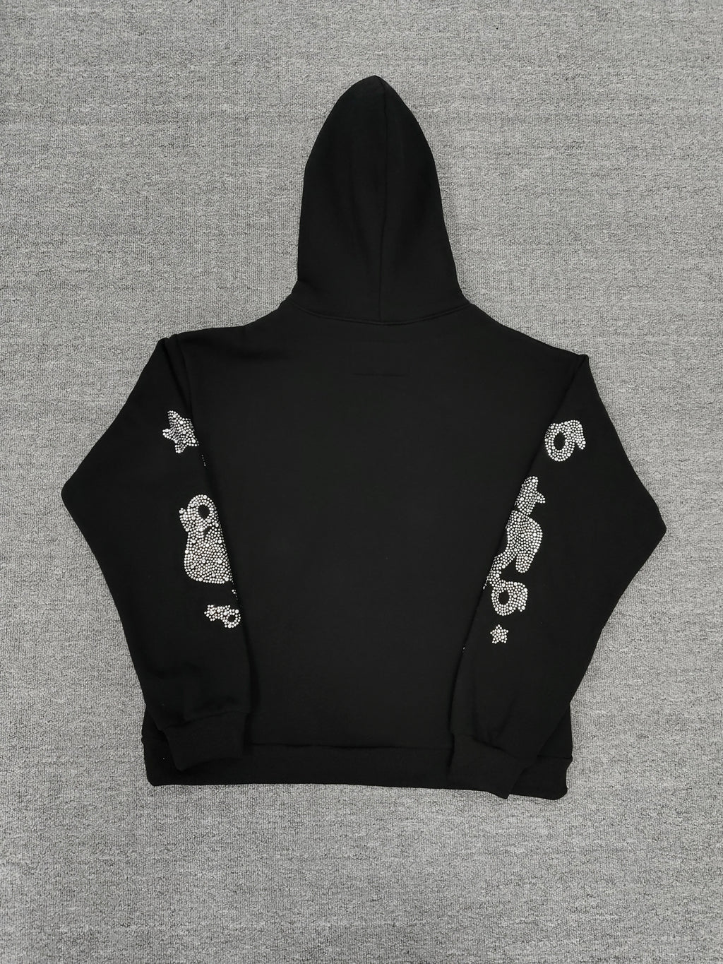 a Sp5der black rhinestone star logo hoodie