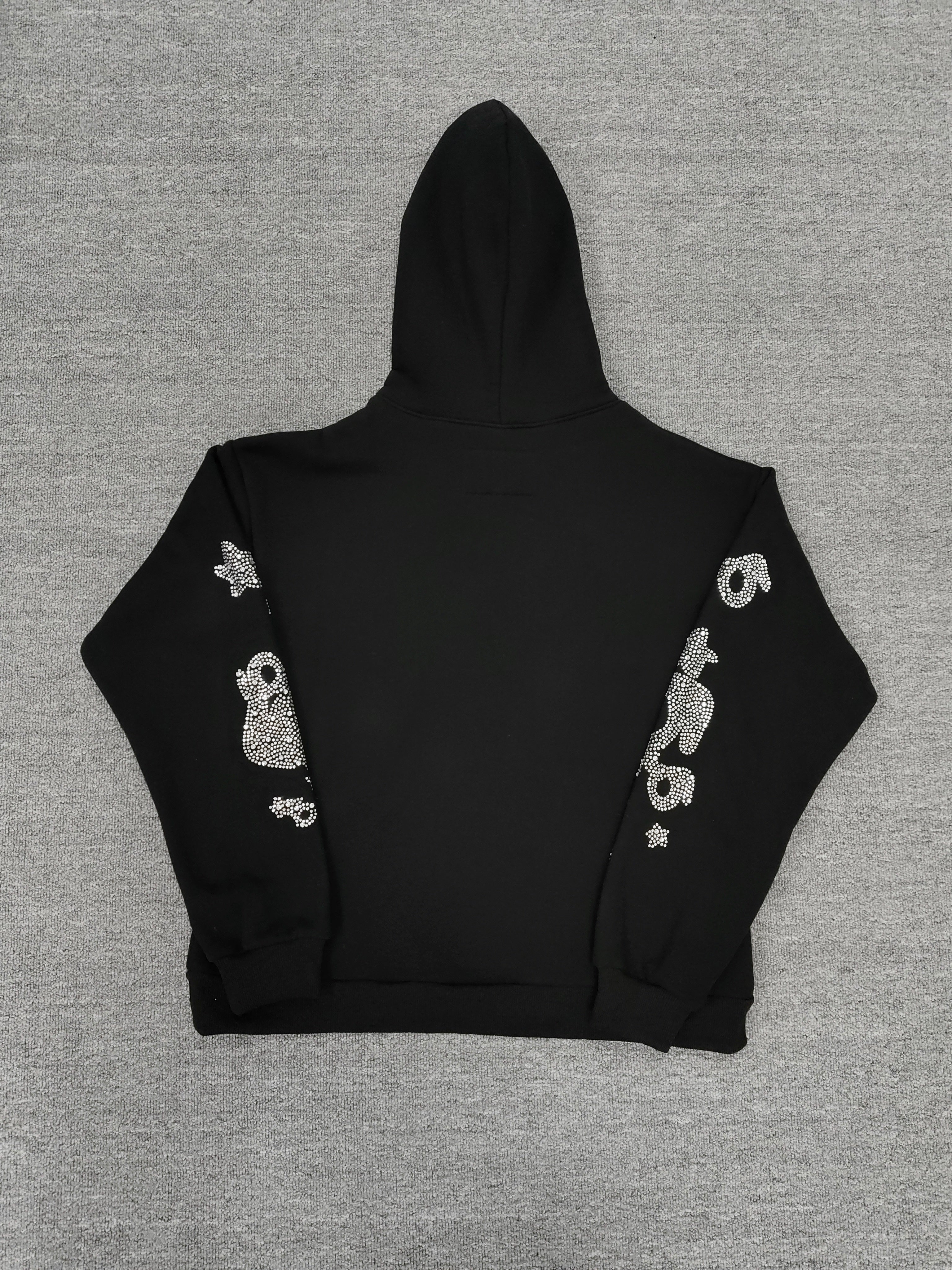a Sp5der black rhinestone star logo hoodie