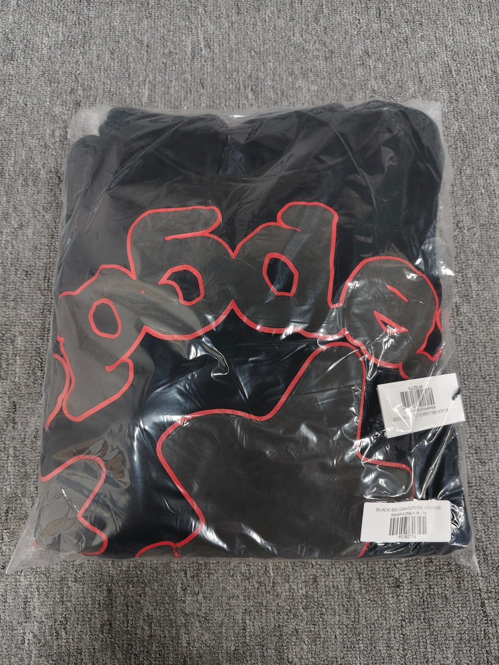 a black Sp5der Beluga Outline Hoodie featuring red-outlined star graphics