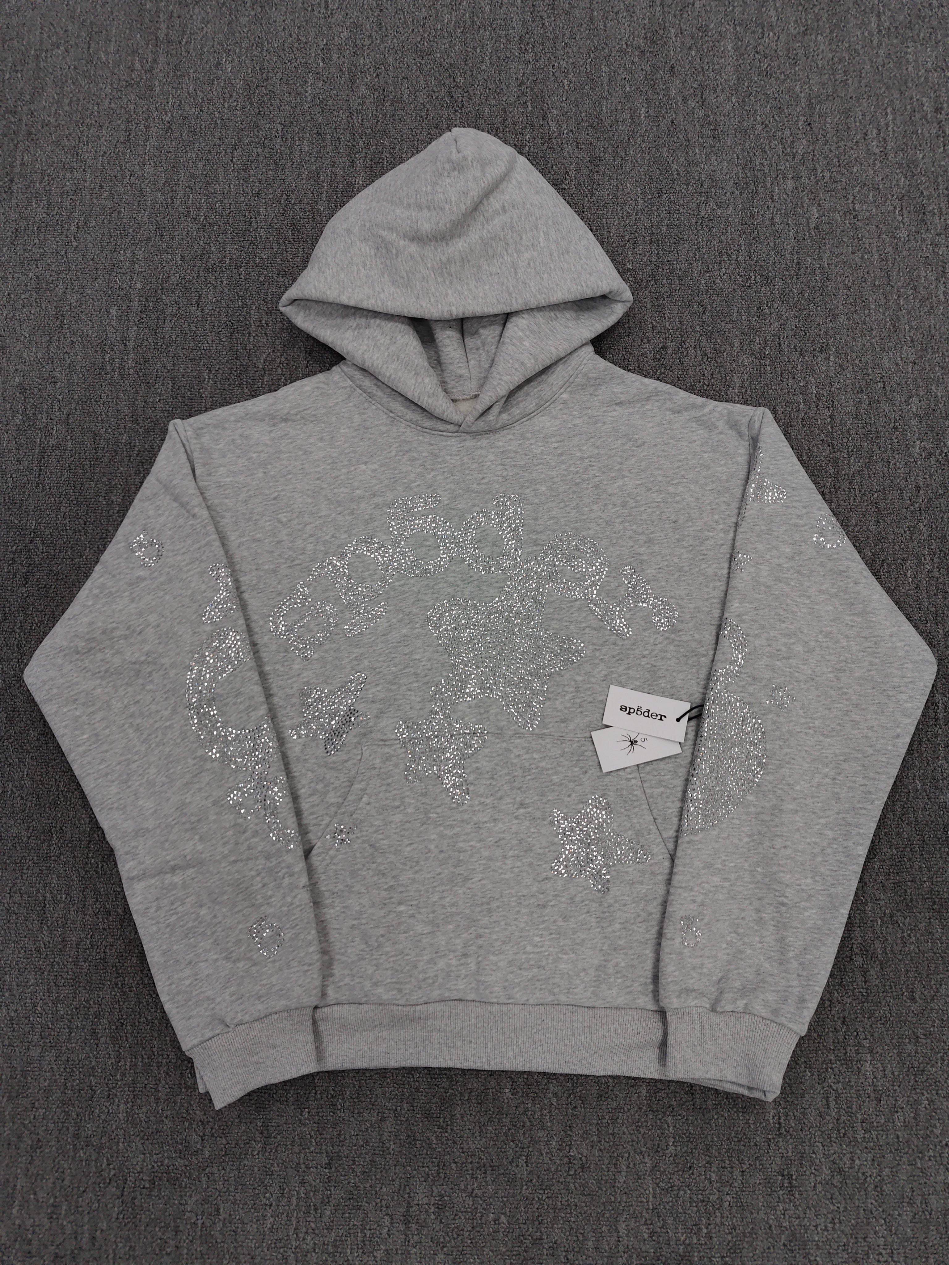 heather grey Sp5der Rhinestone Beluga hoodie features prominent crystal-embellished star designs on the front and sleeves