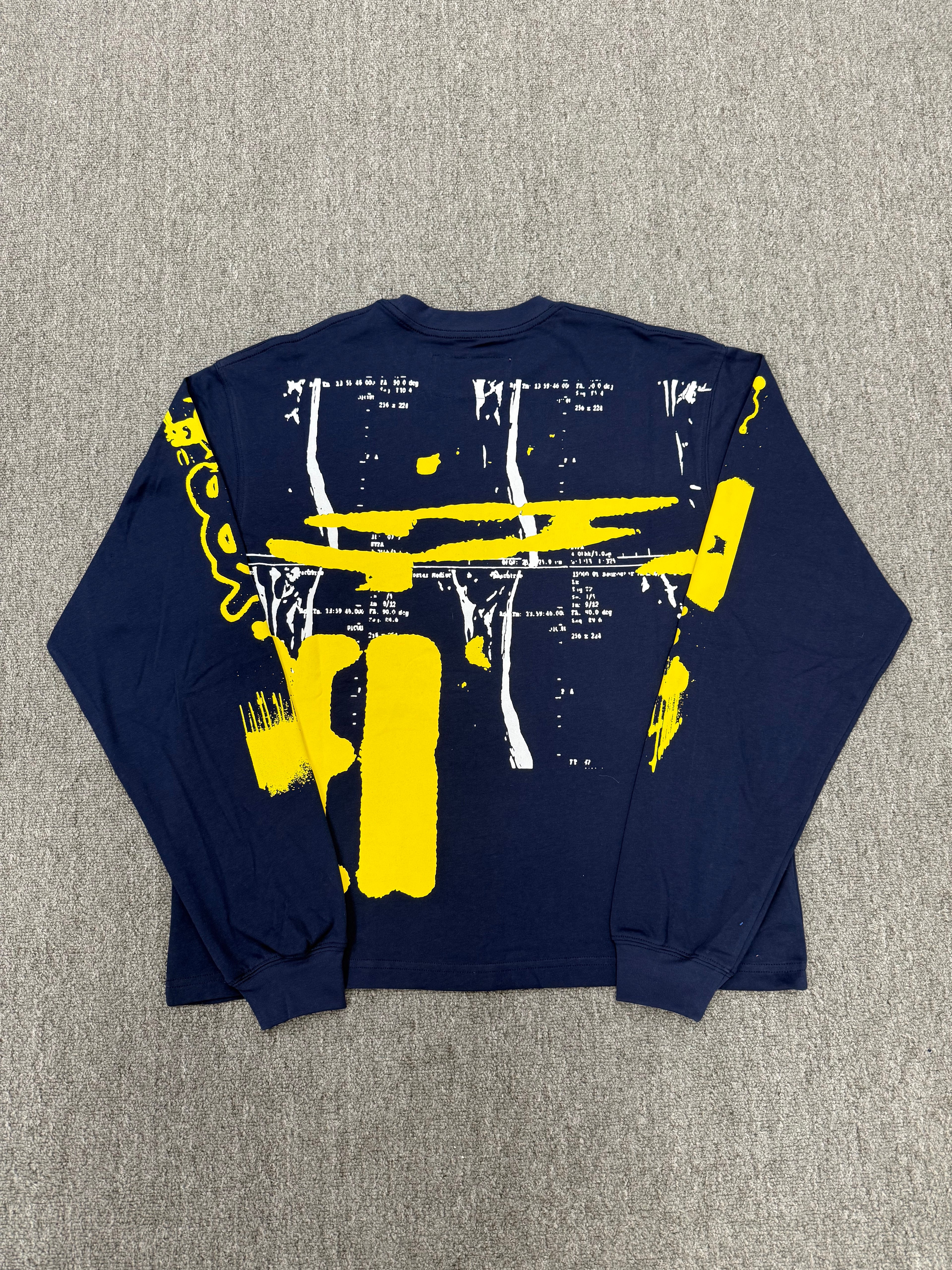 navy blue Sp5der X-Ray Longsleeve featuring bright yellow graphics on the front and sleeves