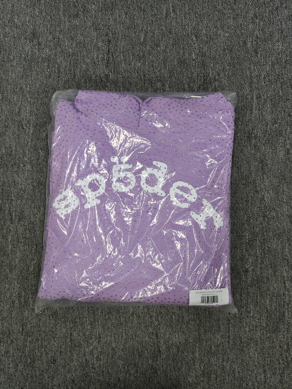light purple Sp5der rhinestone arch logo hoodie is crafted from cotton fleece and features a glittering finish