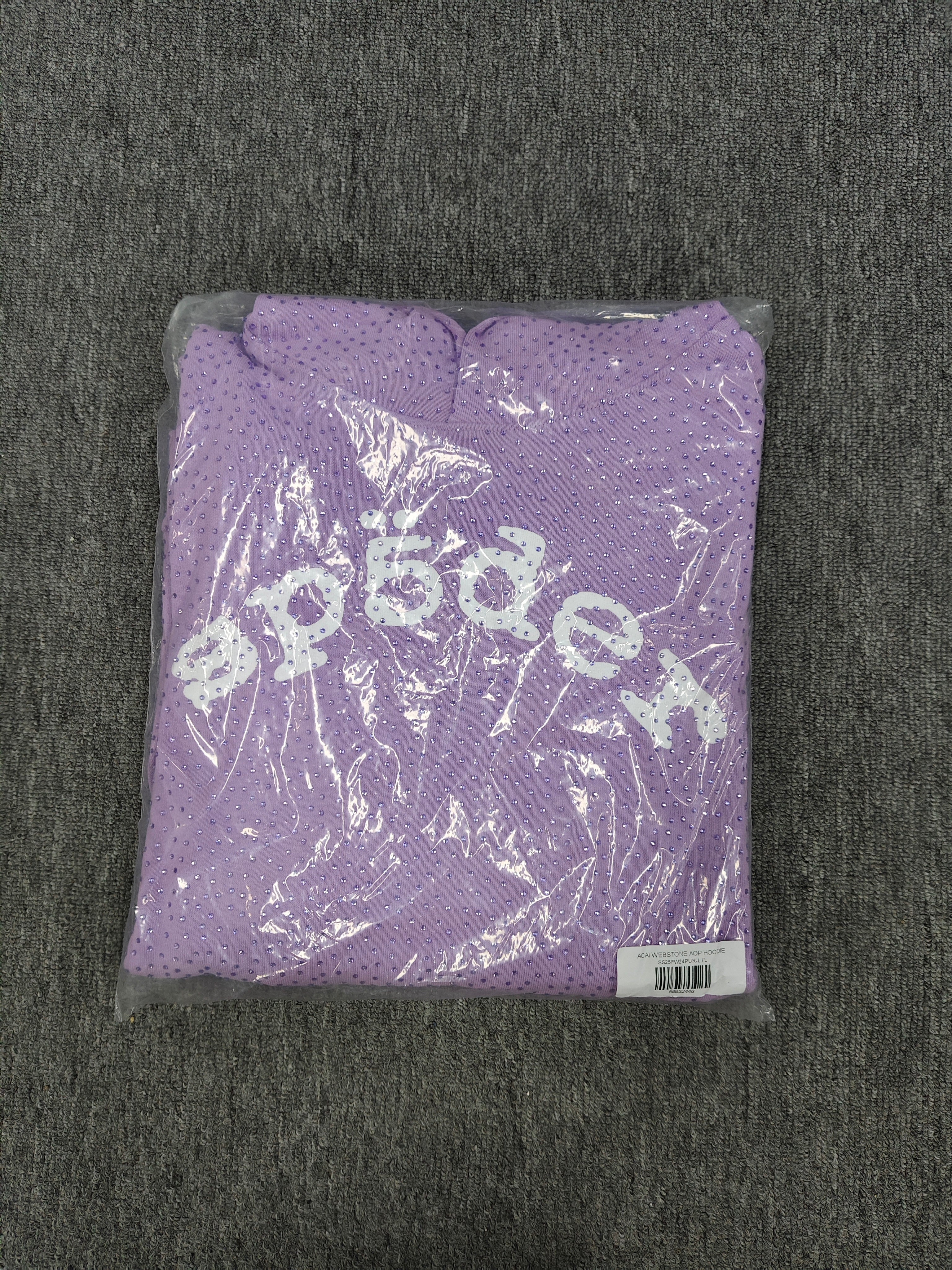 light purple Sp5der rhinestone arch logo hoodie is crafted from cotton fleece and features a glittering finish