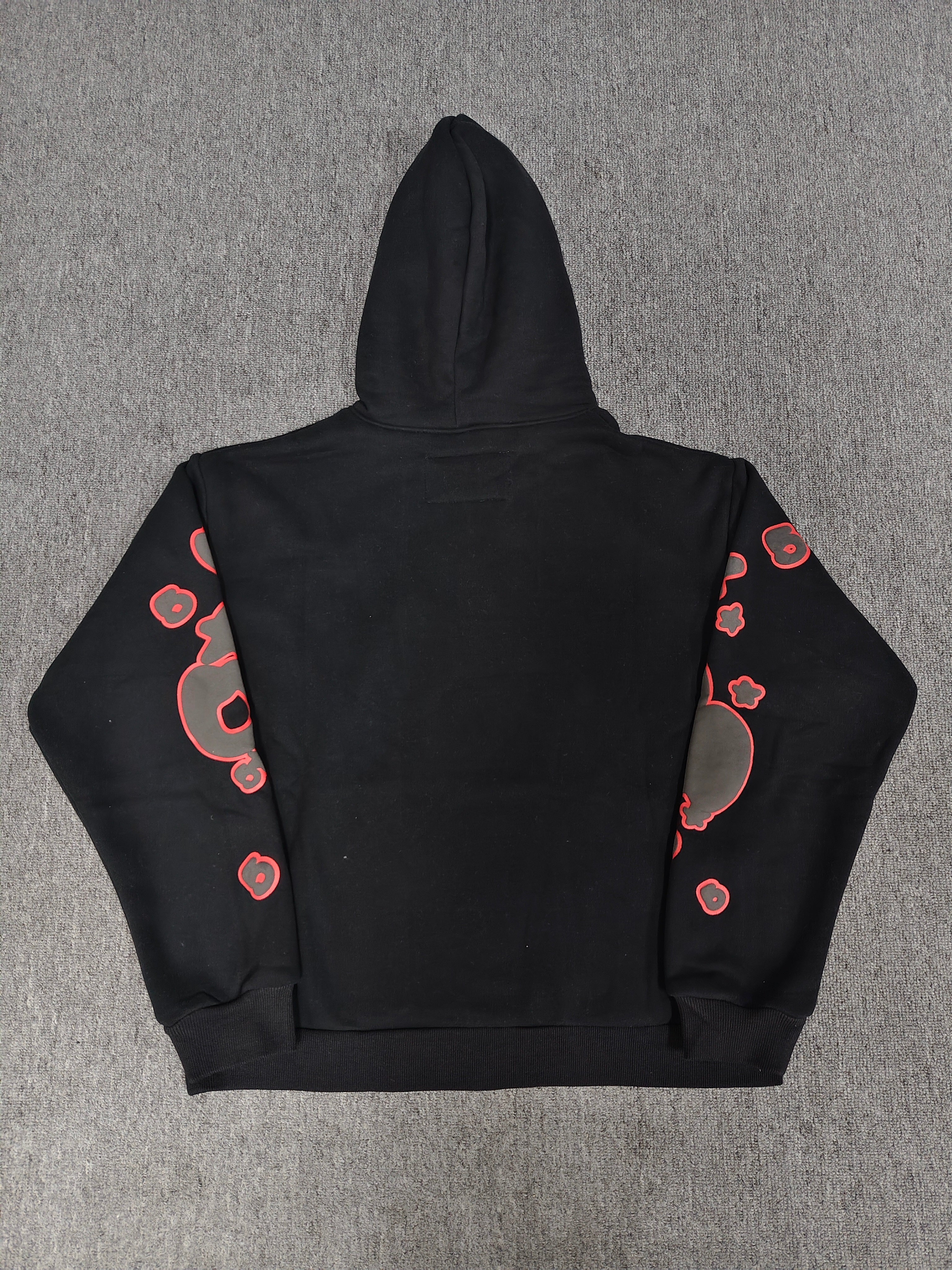 a black Sp5der Beluga Outline Hoodie featuring red-outlined star graphics