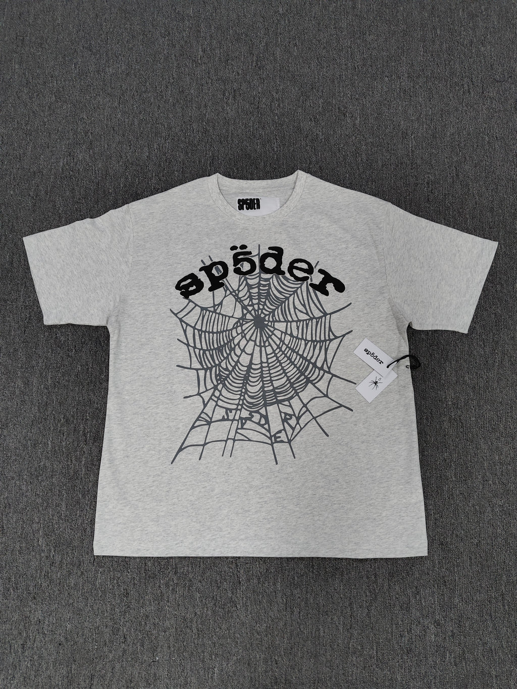 Sp5der shirts are featured in multiple colorways with prominent spiderweb branding