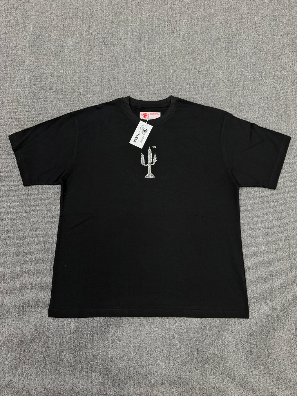 a black Sp5der VAA TM Tee from the Fall/Winter 2025 collection, featuring a rhinestone-embellished cactus graphic