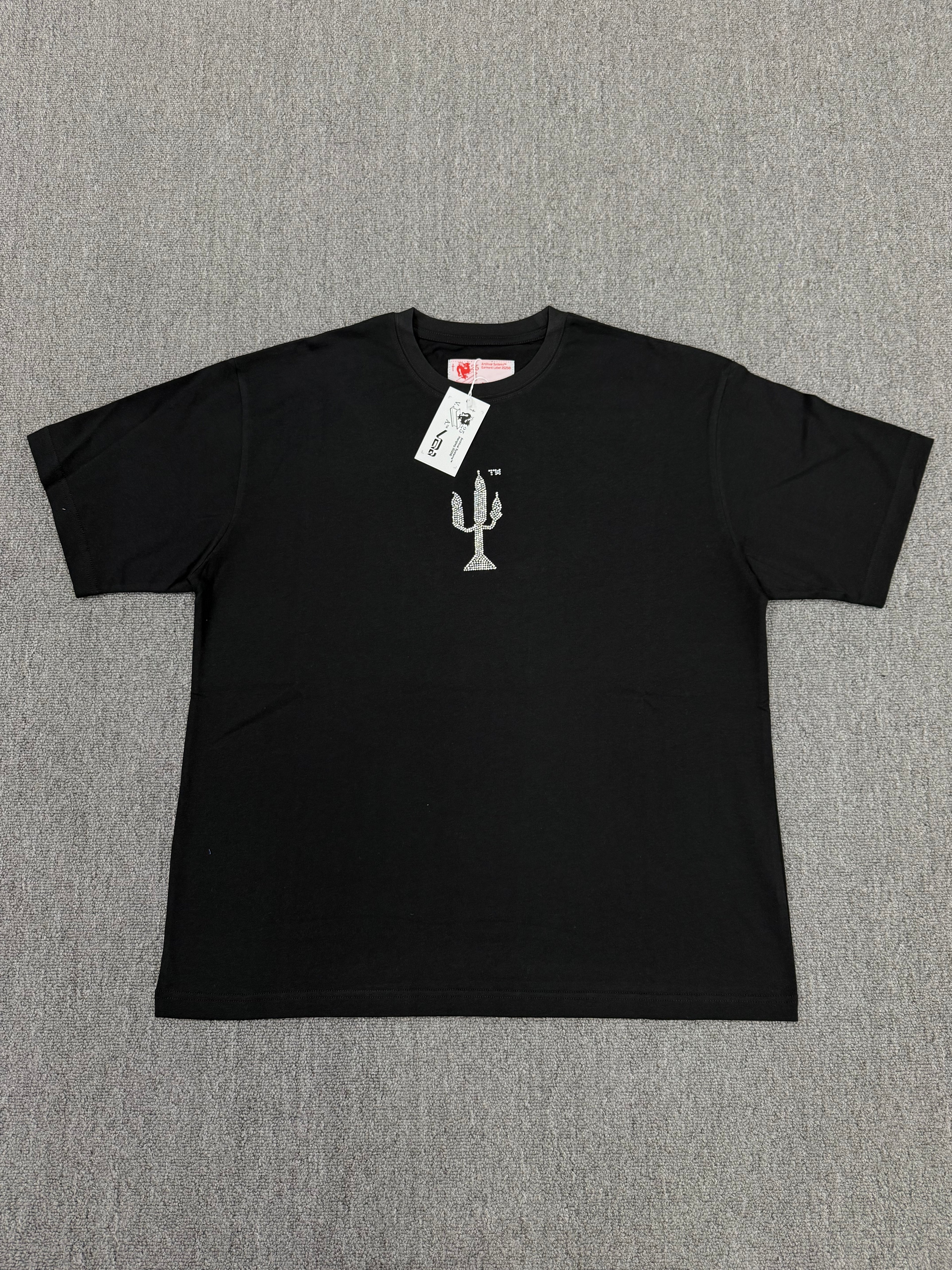 a black Sp5der VAA TM Tee from the Fall/Winter 2025 collection, featuring a rhinestone-embellished cactus graphic