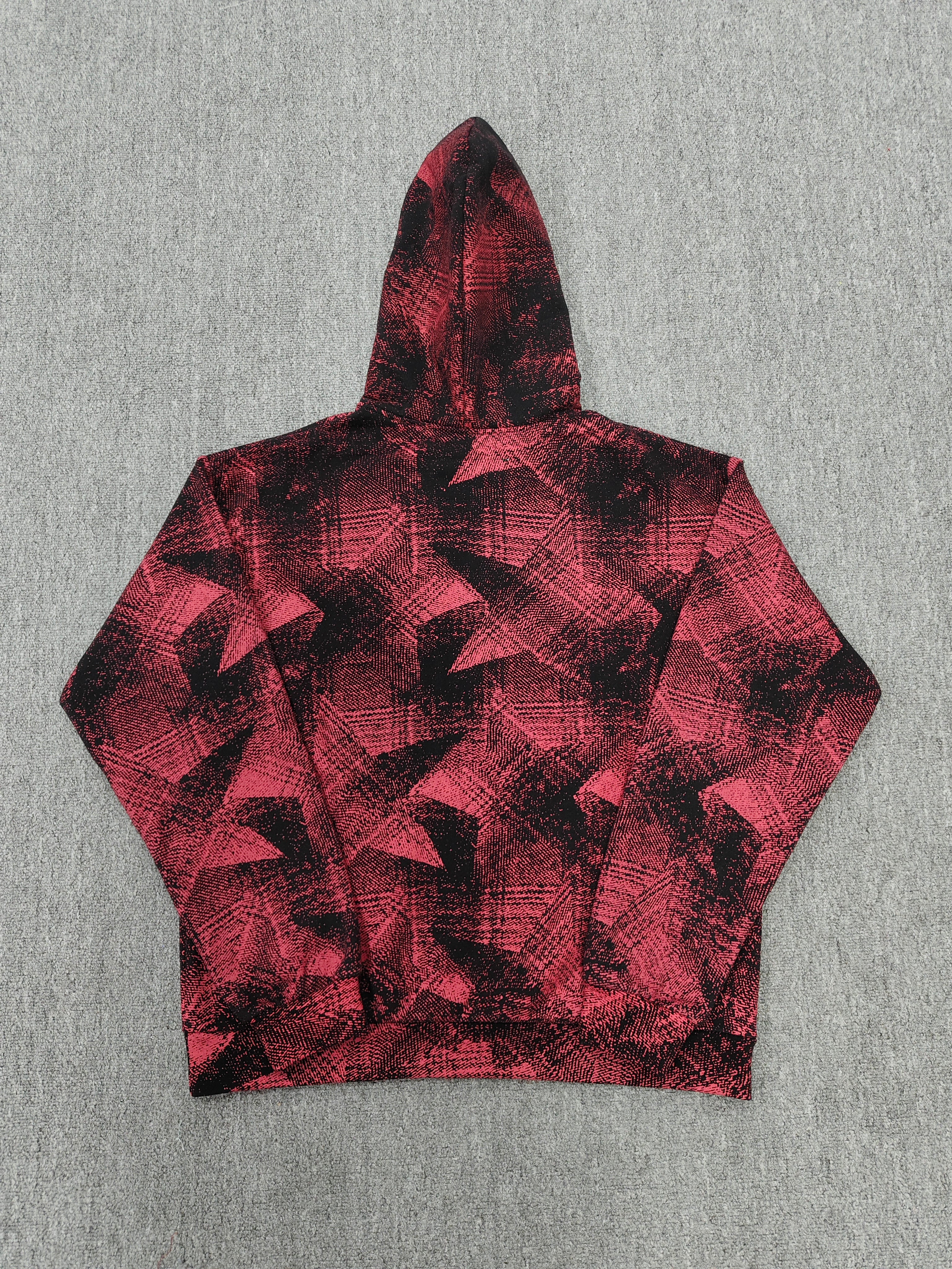 a Sp5der Plaid Splatt Hoodie in red, featuring a prominent white star graphic