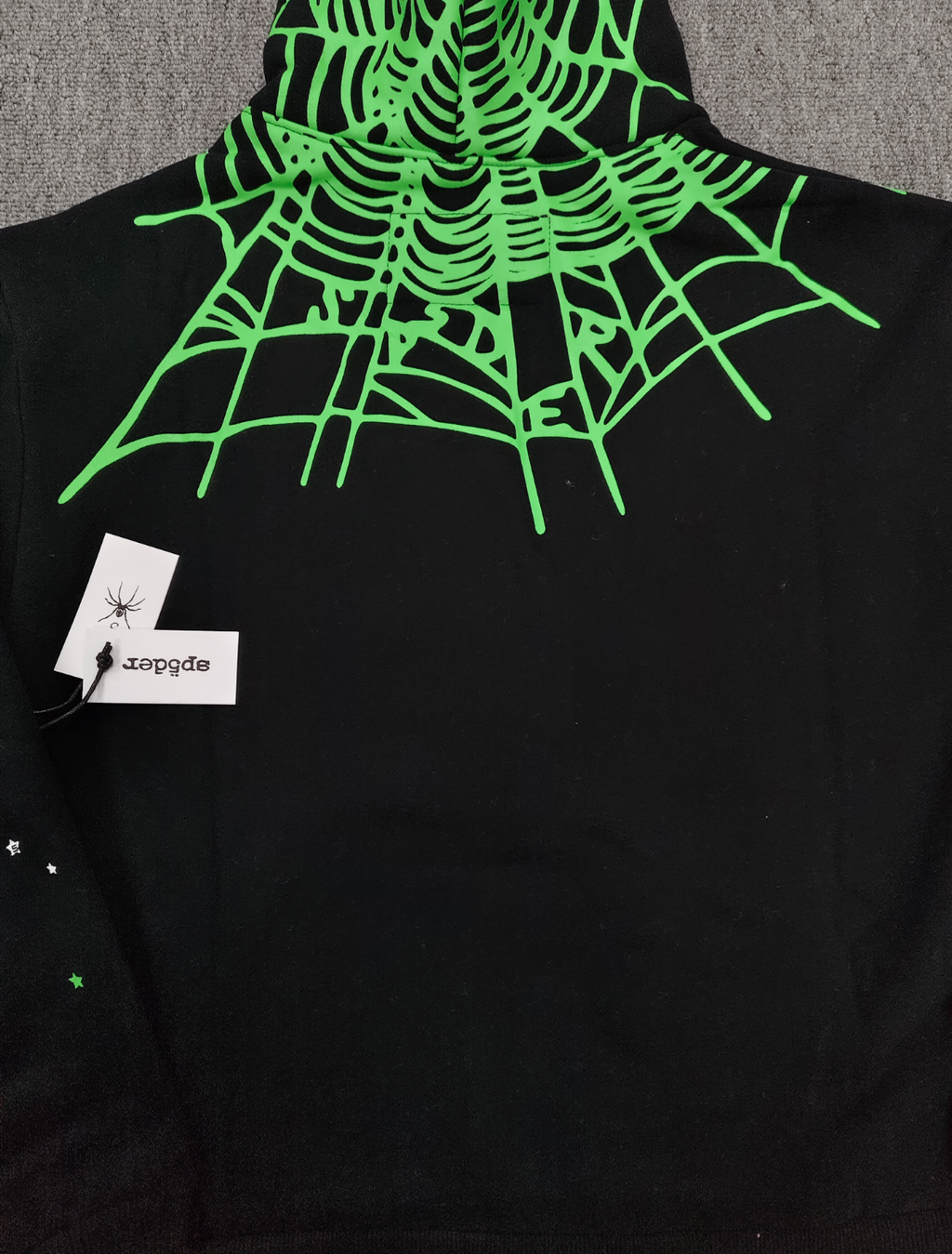 Sp5der Heavy Web Hoodie in black features a striking green and white star graphic print
