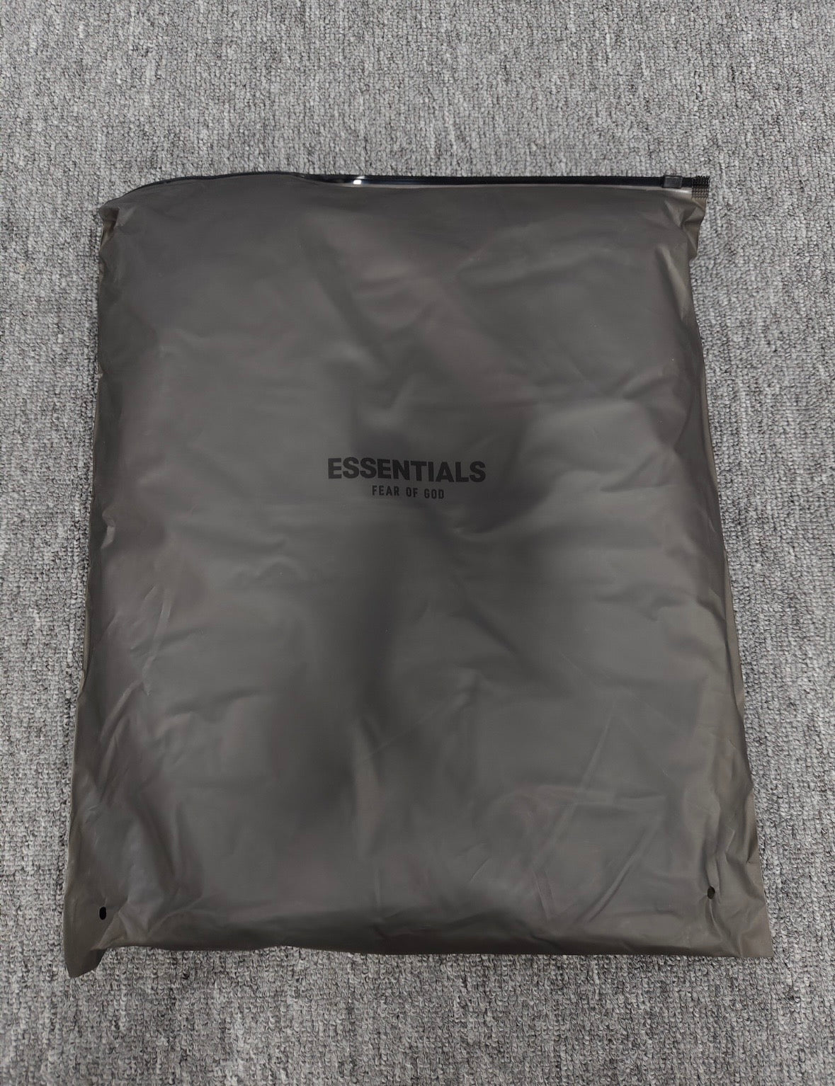 Fear of God Essentials Nylon
Fleece Hoodie 'Jet Black/Jet Black