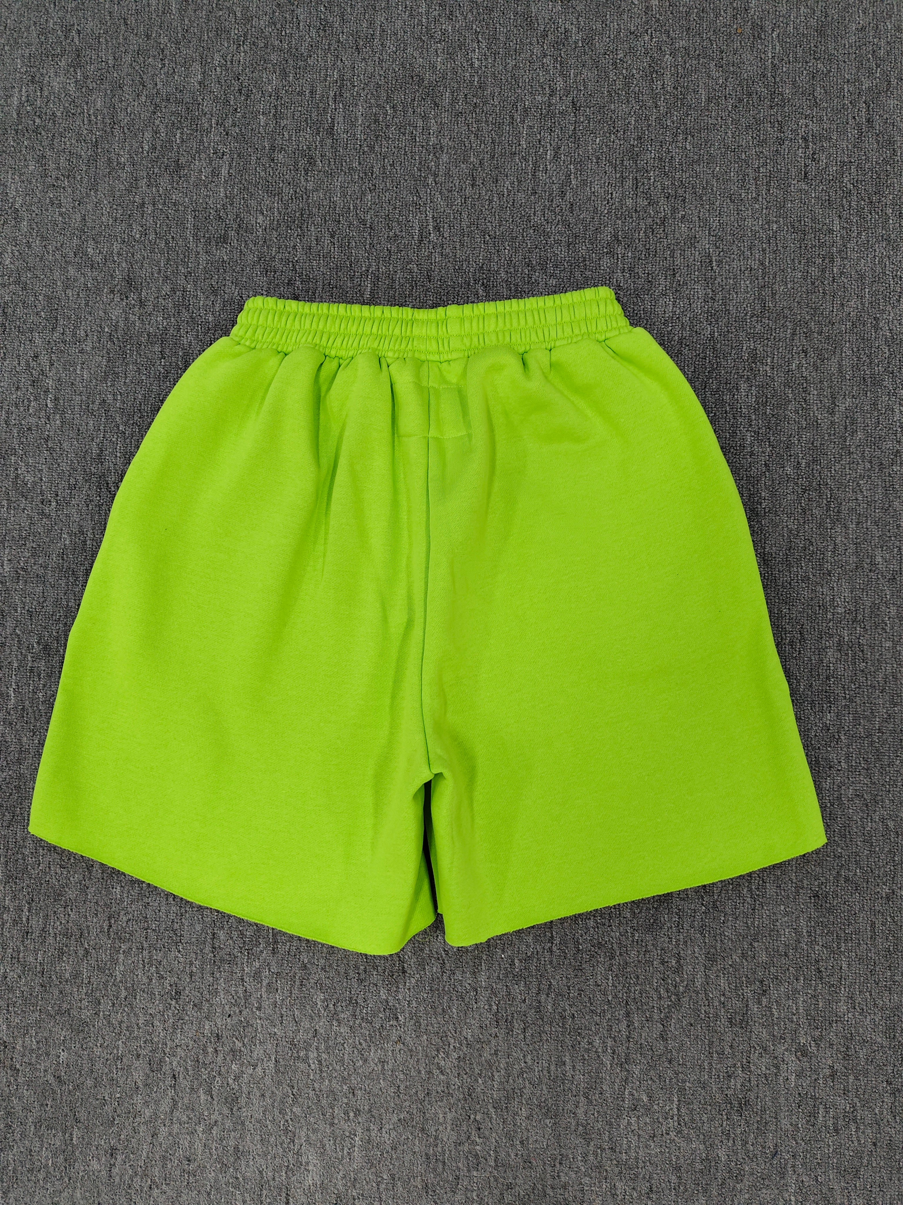neon green Sp5der OG Web V2 sweatshorts feature a white logo print across the front