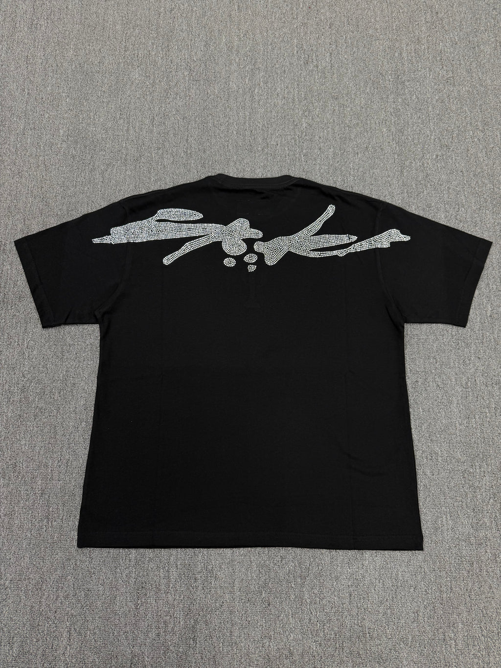 a black Sp5der VAA TM Tee from the Fall/Winter 2025 collection, featuring a rhinestone-embellished cactus graphic