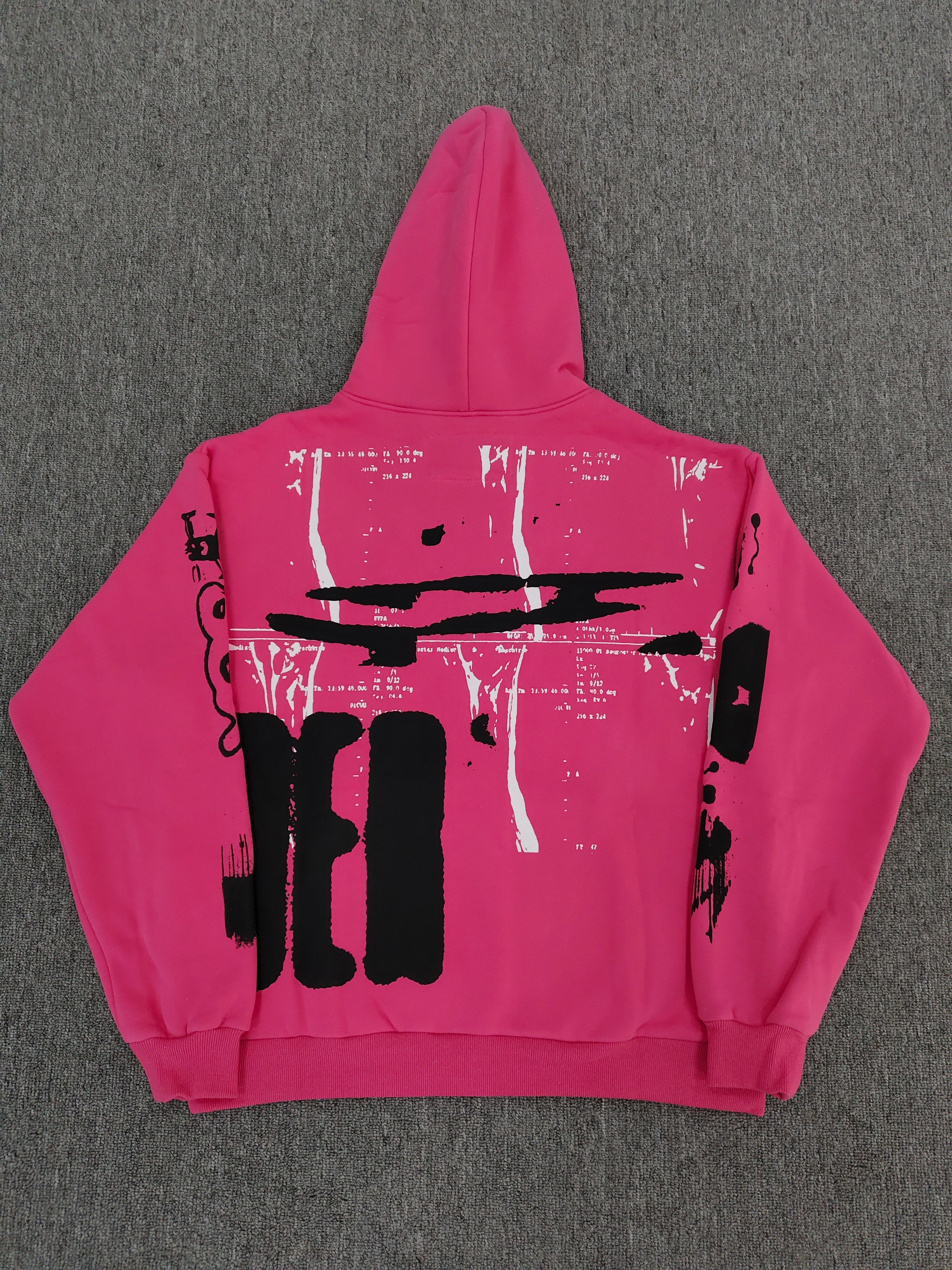 hot pink Sp5der hoodie featuring large, bold black screen-printed graphics on the front and arms.