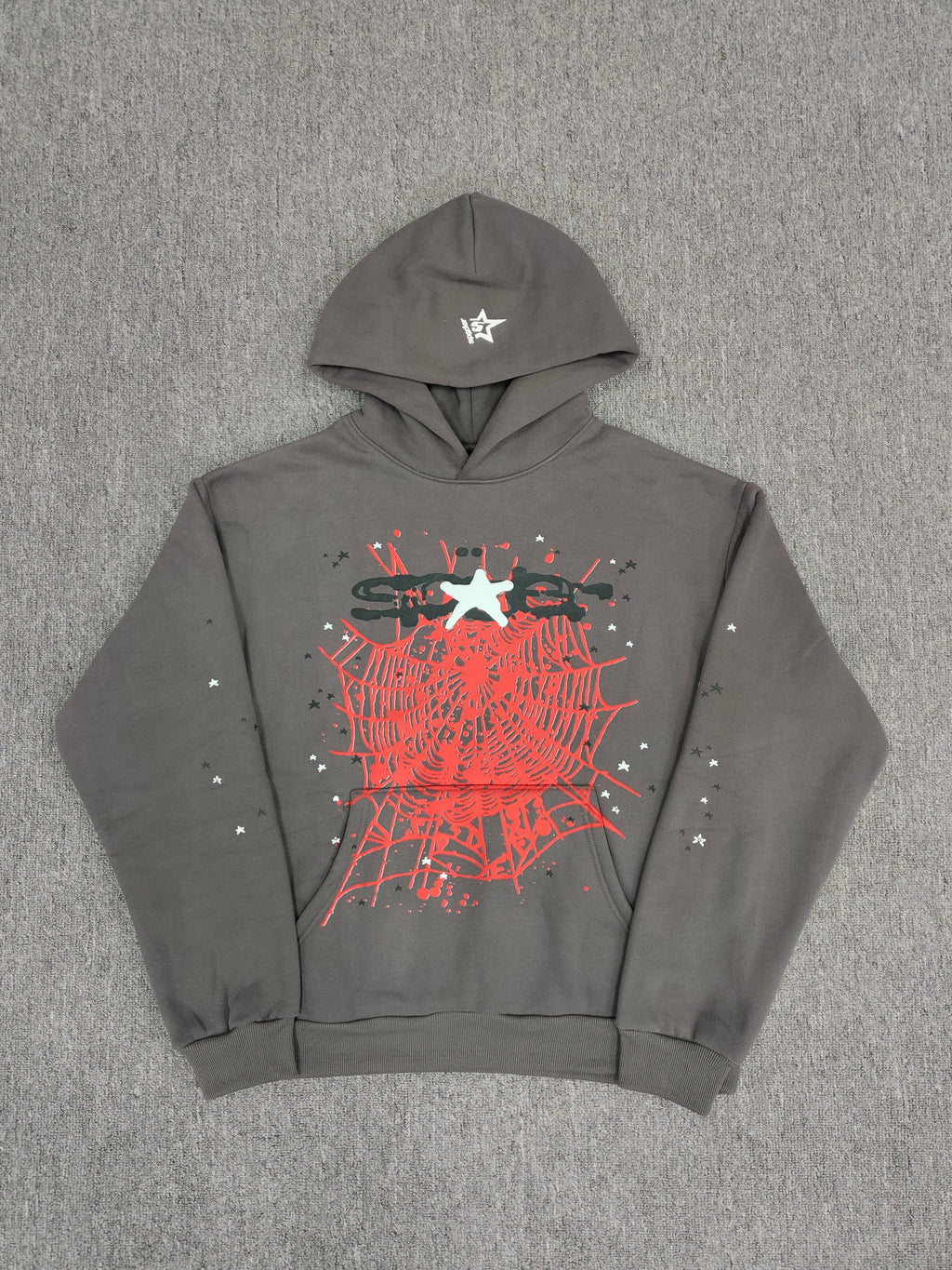 slate grey Sp5der Splat Punk Hoodie features a prominent red spider-web graphic with white star accents