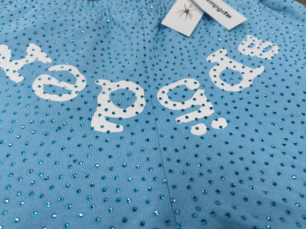 sky blue Sp5der Classic Sweatpants feature an all-over rhinestone design and the brand's logo in a sparkling applique