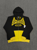 a Sp5der T&F Zip Hoodie in black and yellow with contrast stitching